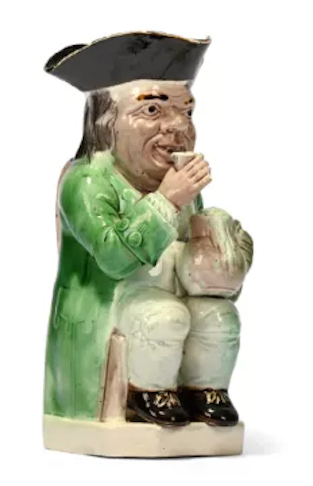 A STAFFORDSHIRE CREAMWARE TOBY JUG OF RALPH WOOD TYPE, CIRCA 1780