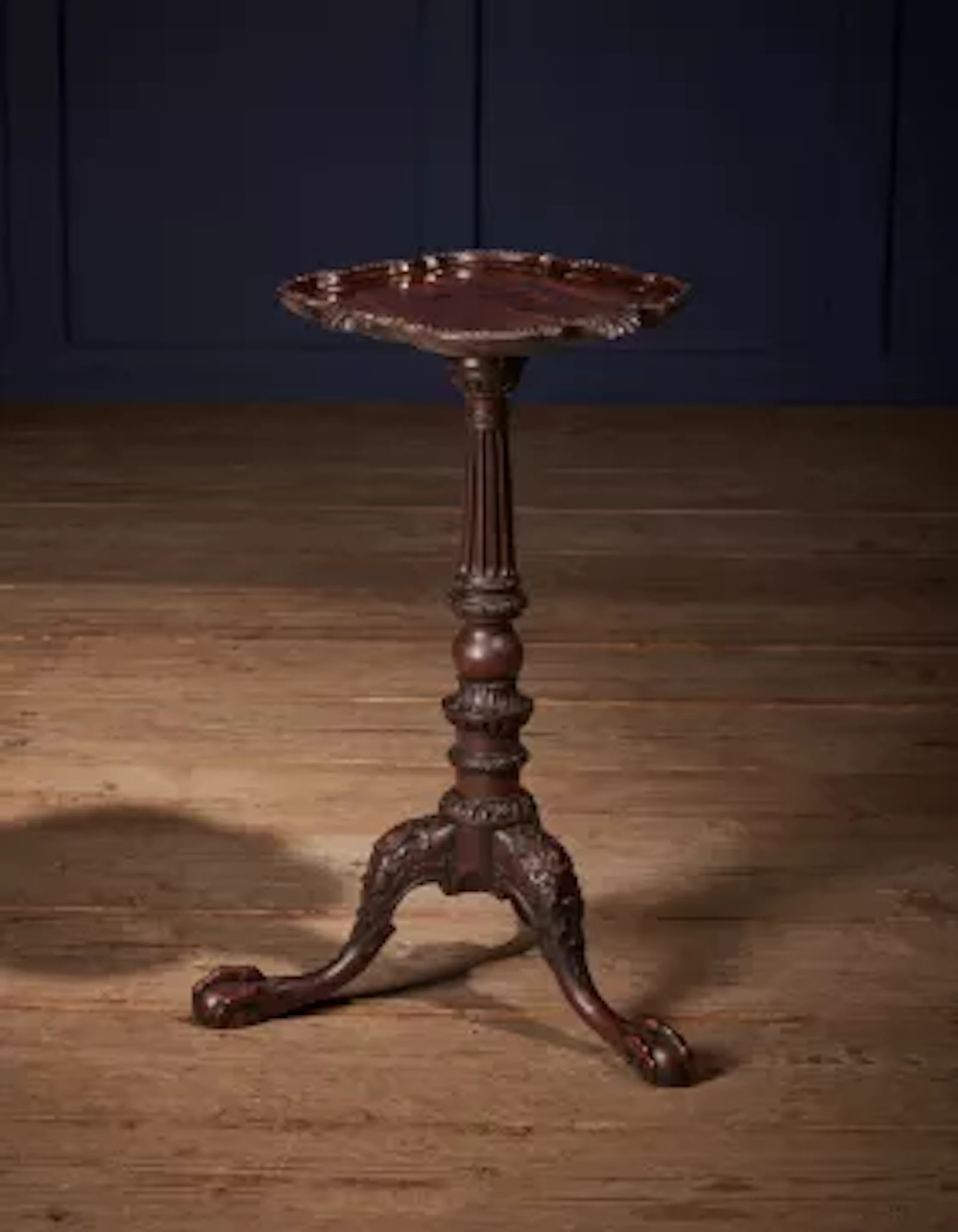 A FINE GEORGE II CARVED MAHOGANY CANDLESTAND, CIRCA 1755