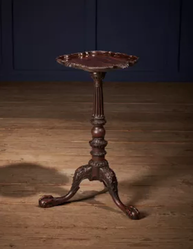 A FINE GEORGE II CARVED MAHOGANY CANDLESTAND, CIRCA 1755