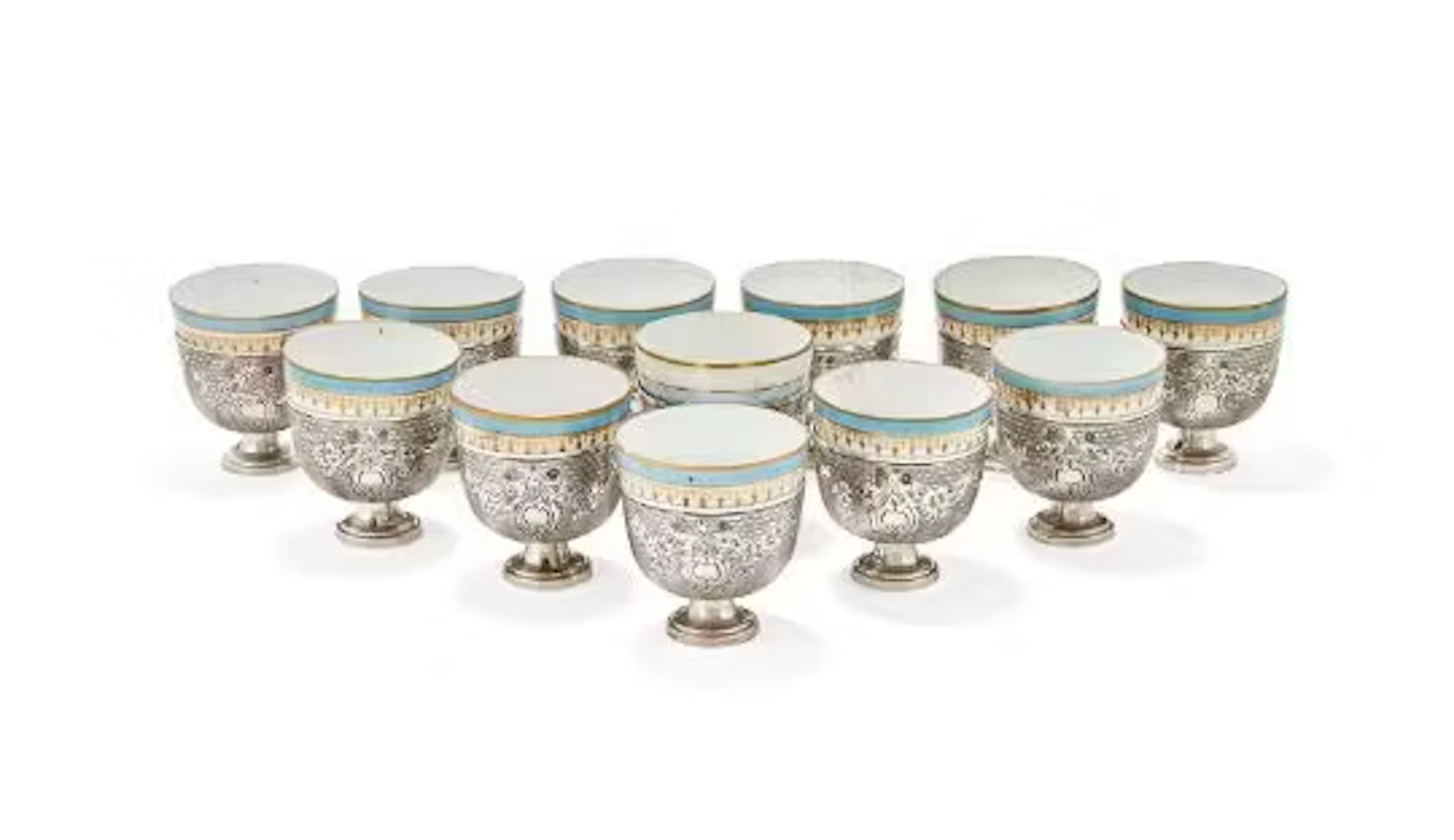 A SET OF TWELVE OTTOMAN SILVER ZARFS