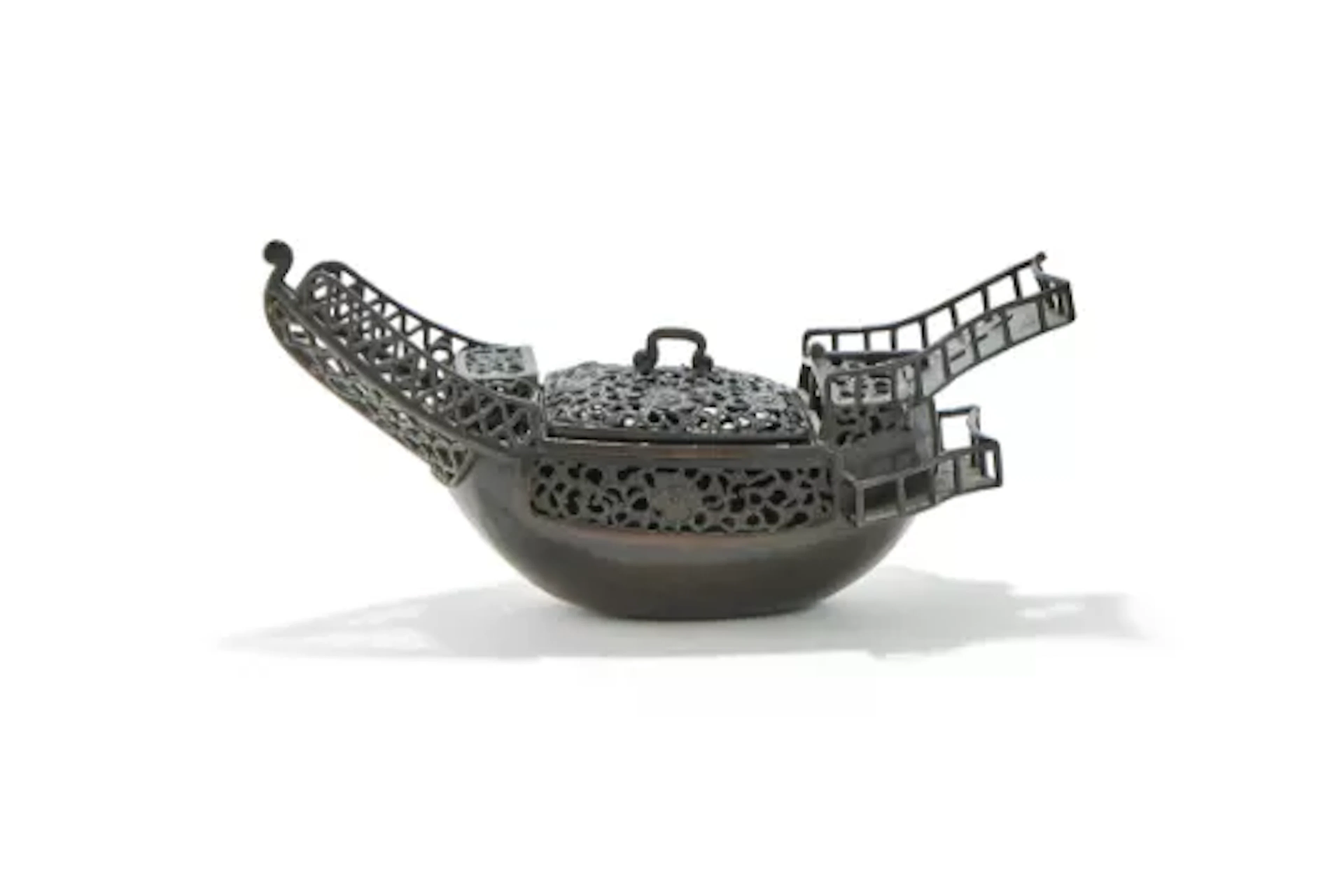 A Chinese bronze boat form incense burner and cover, 17th or 18th century