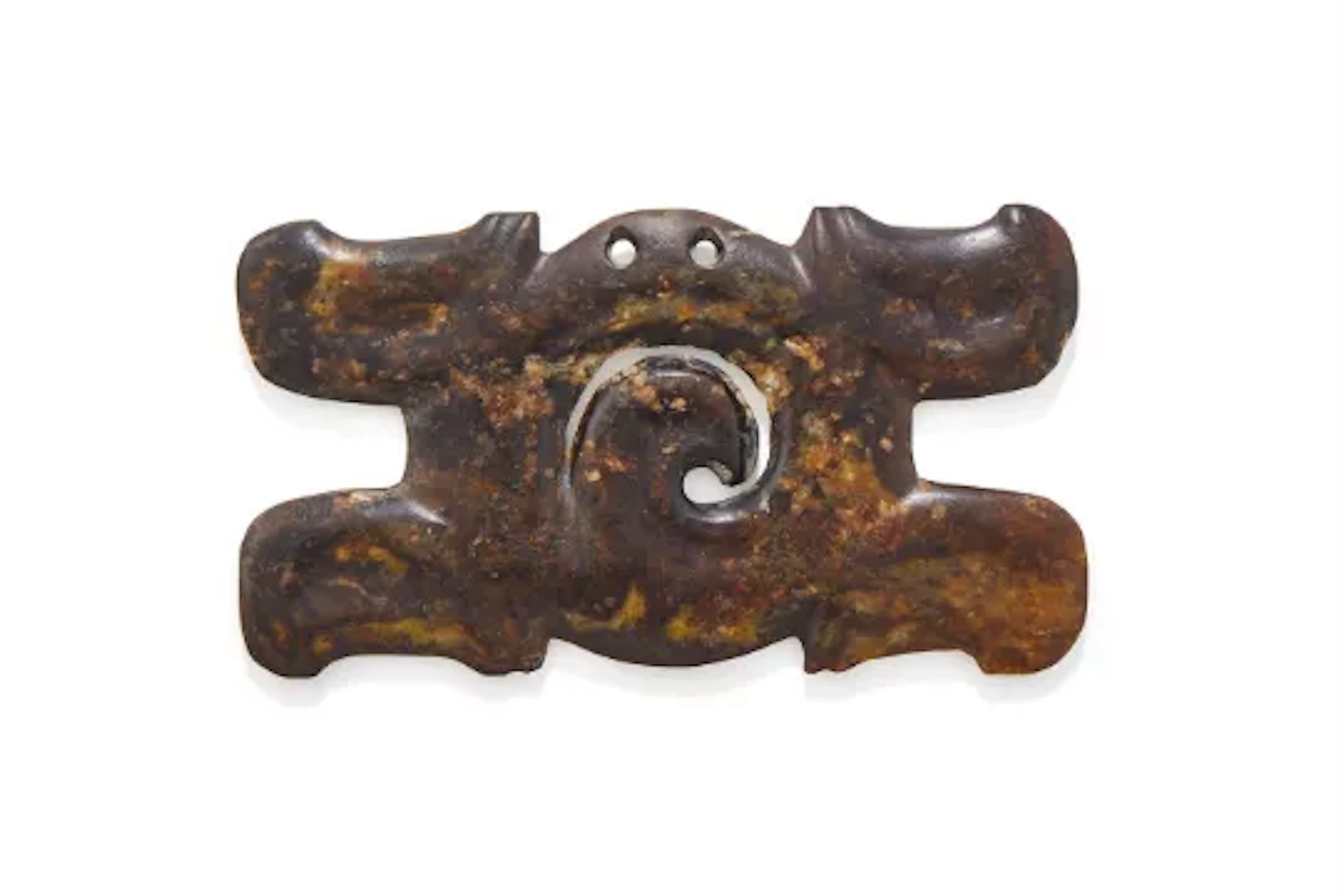A Chinese black jade 'Cloud scroll' ornament