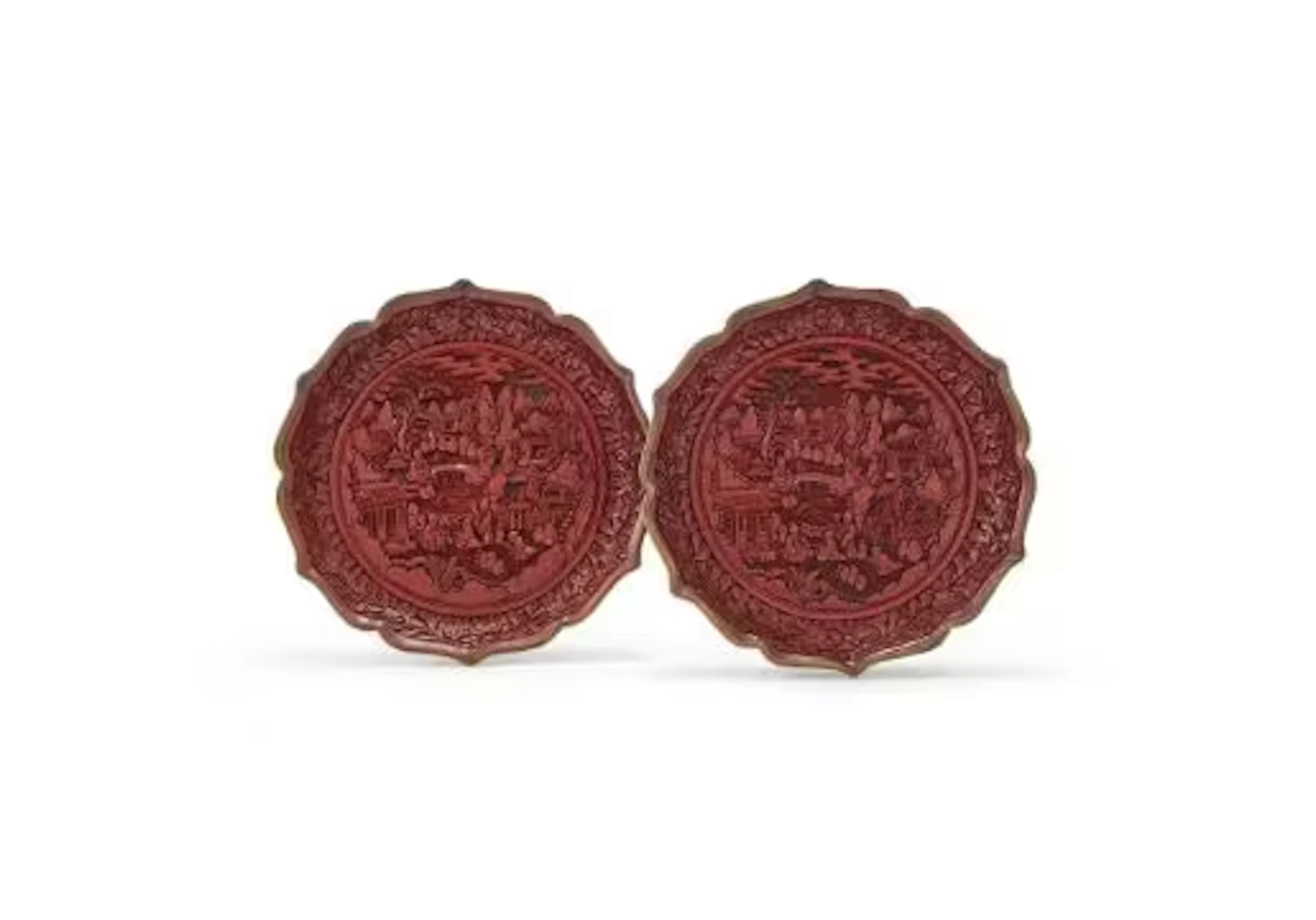 A pair of Chinese cinnabar lacquer lobed dishes