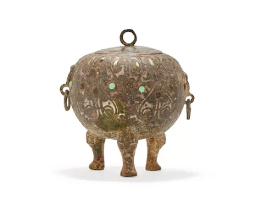 A Chinese bronze inlaid tripod food vessel, dui, Warring States period