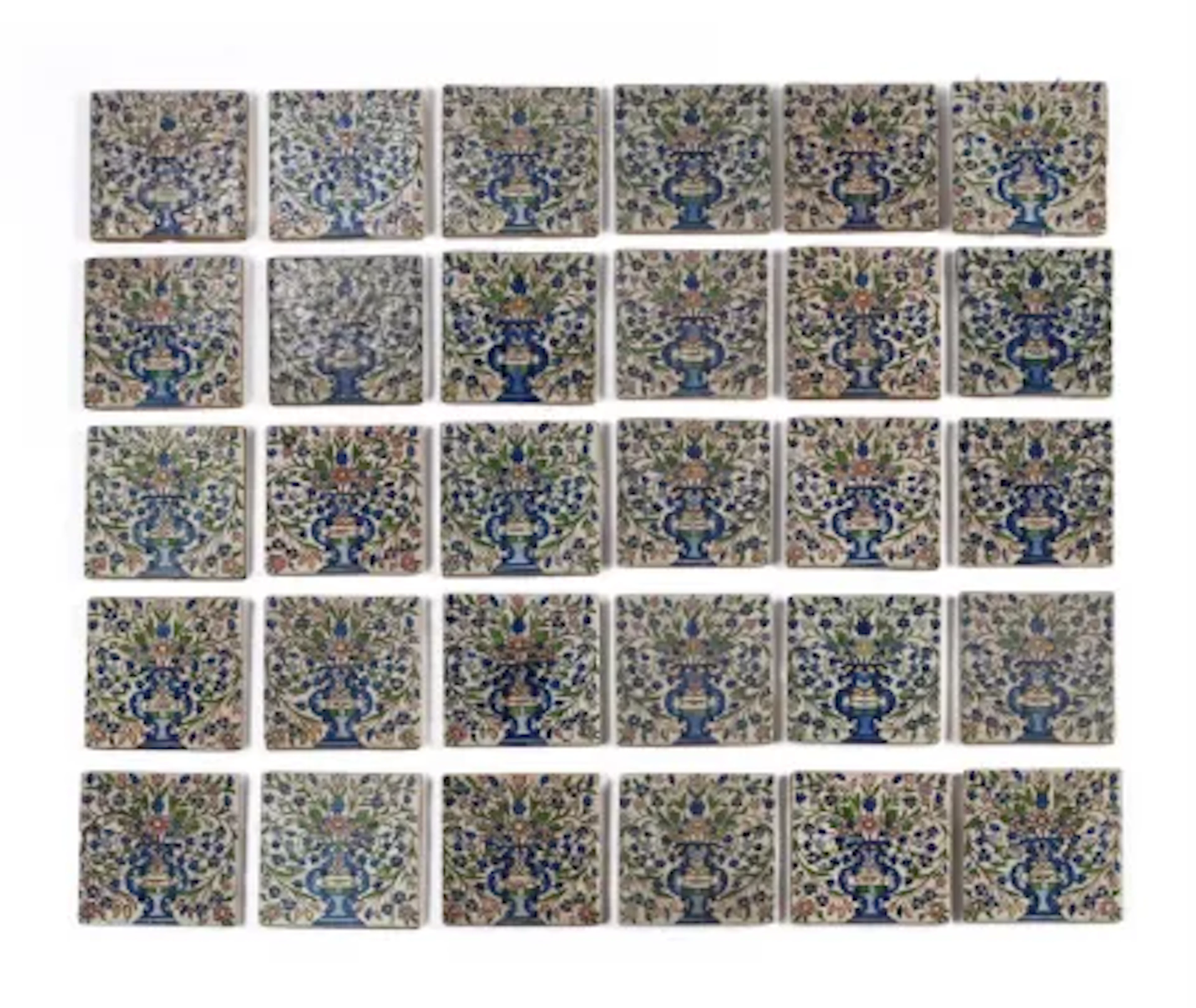A decorative group of thirty Qajar style tiles