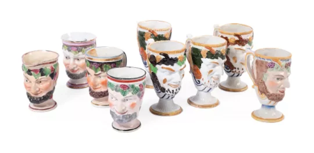 FIVE STAFFORDSHIRE POTTERY SATYR-MASK JUGS WITH FROG INSERTS, MID 19TH CENTURY