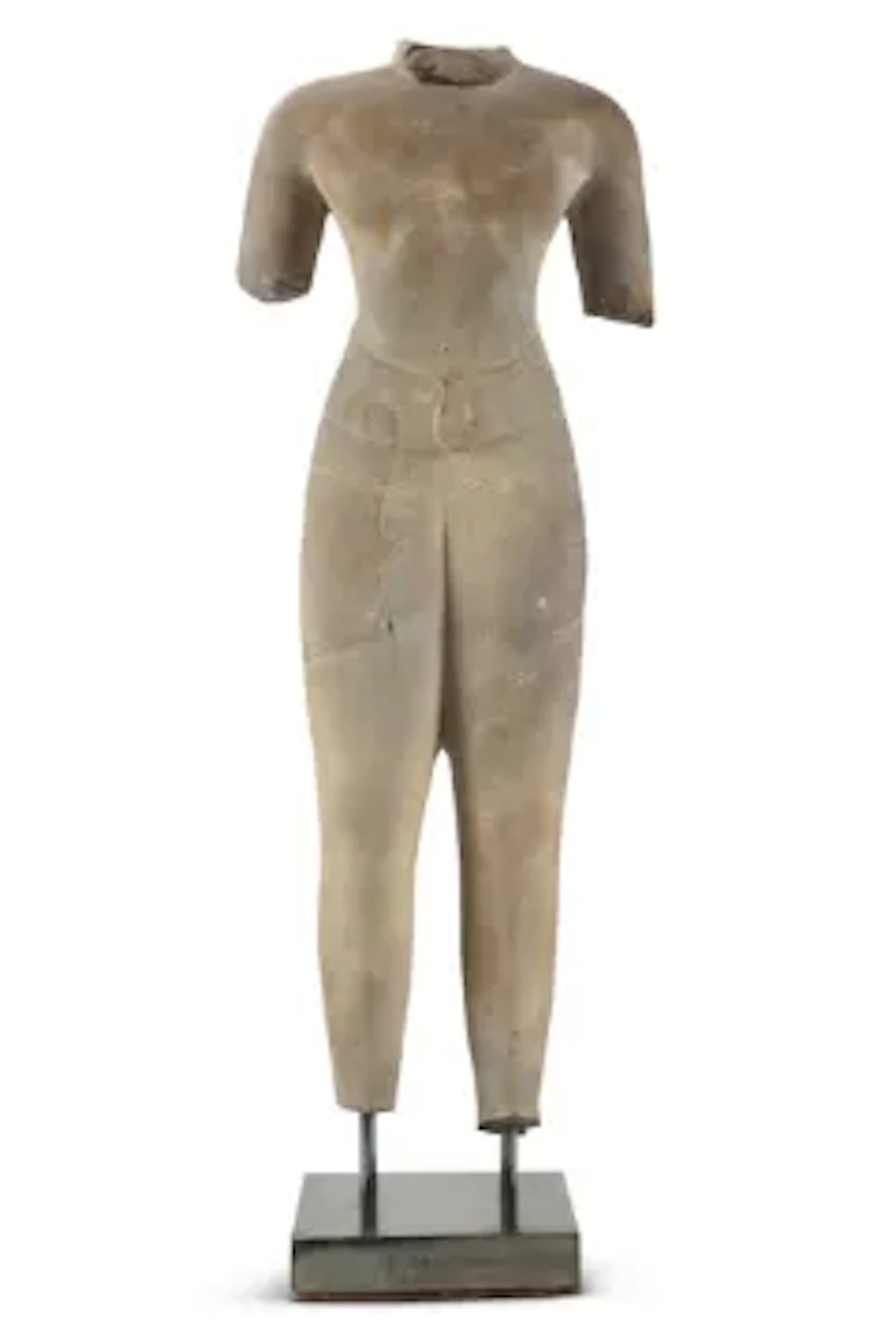 A KHMER GREY SANDSTONE TORSO OF A MALE DEITY, CAMBODIA, CIRCA 12TH CENTURY