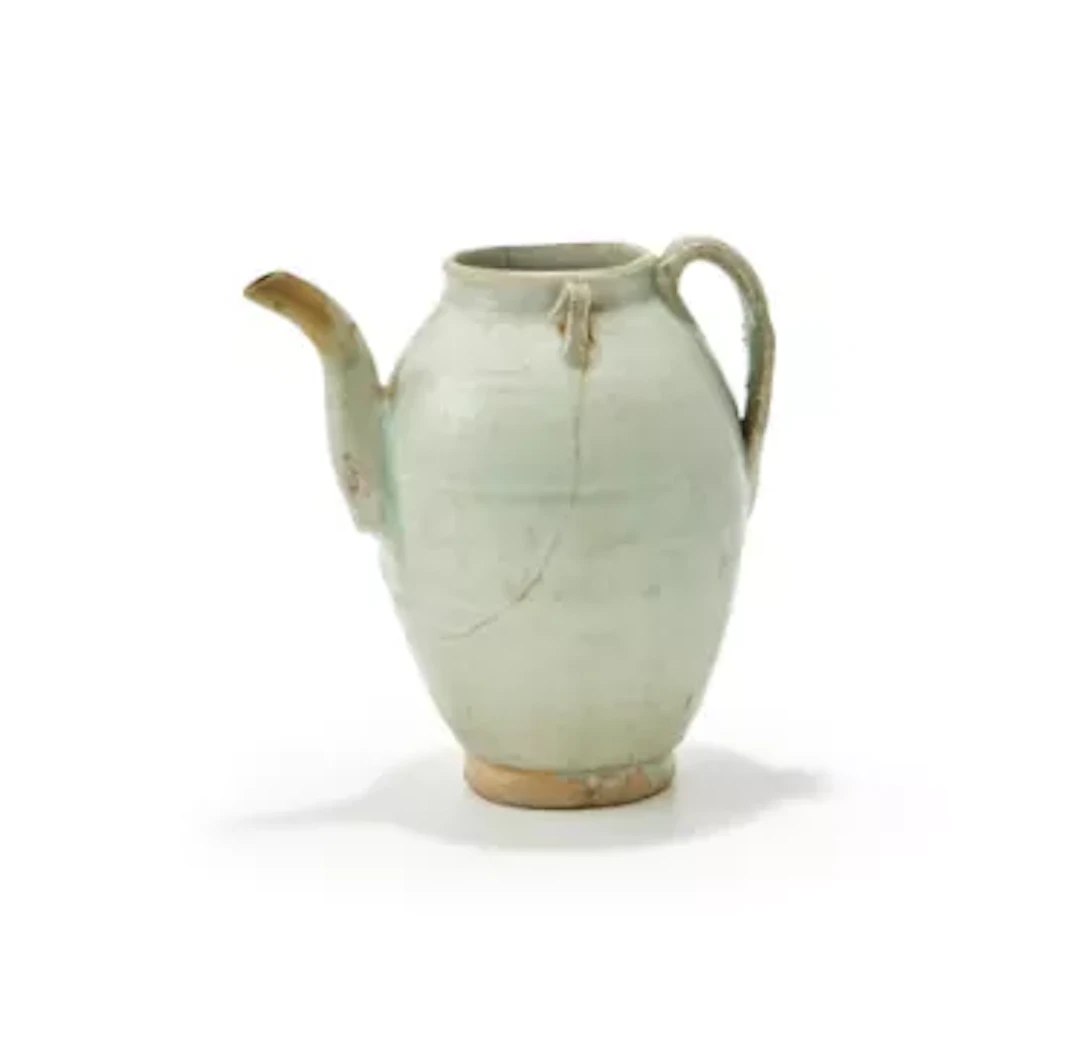 A Chinese celadon glazed ewer, Song or Yuan Dynasty