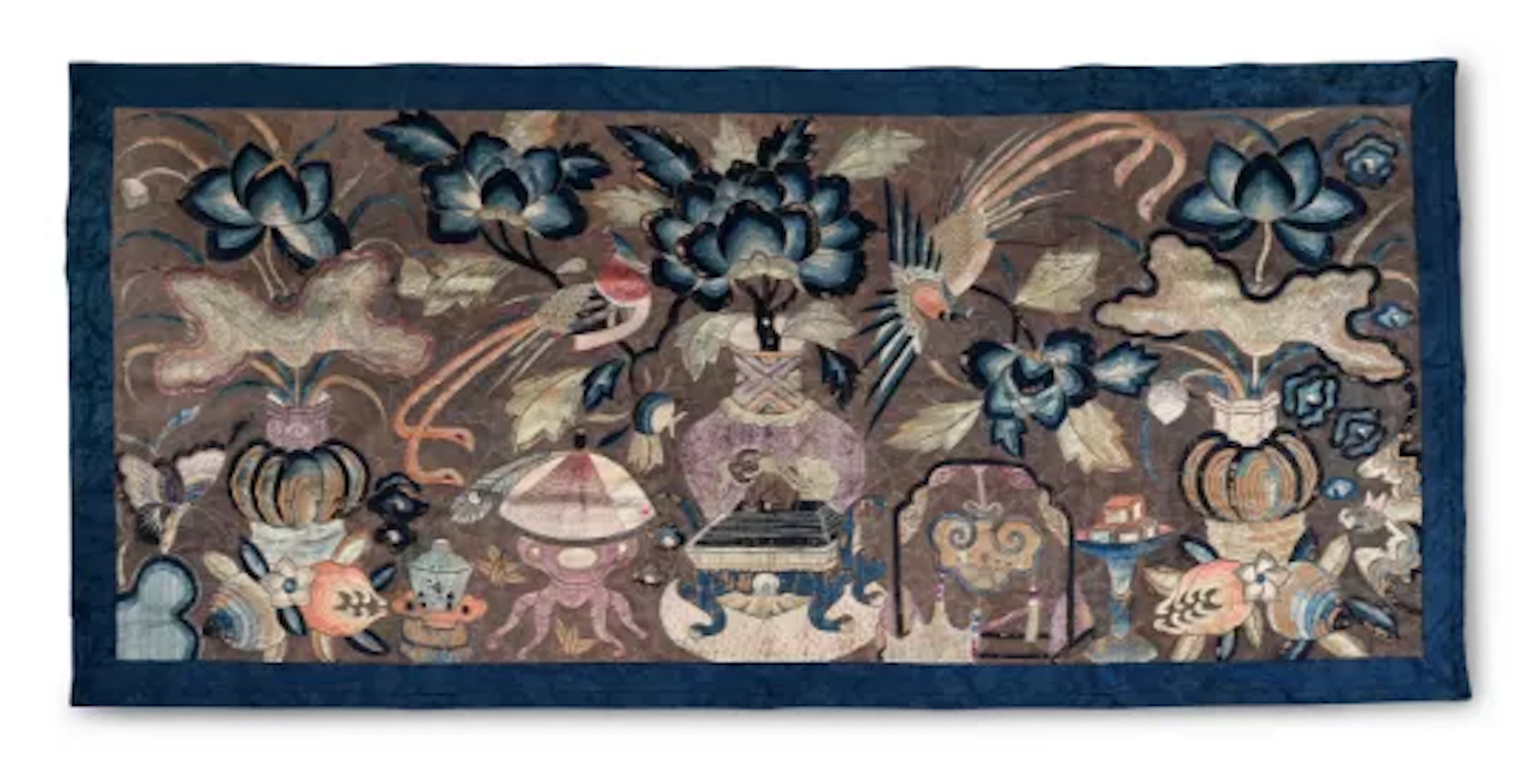 A Chinese large embroidered panel with a silver geometric couched thread ground