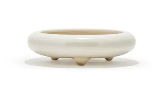 A Dehua type white glazed brush washer, Late Qing dynasty