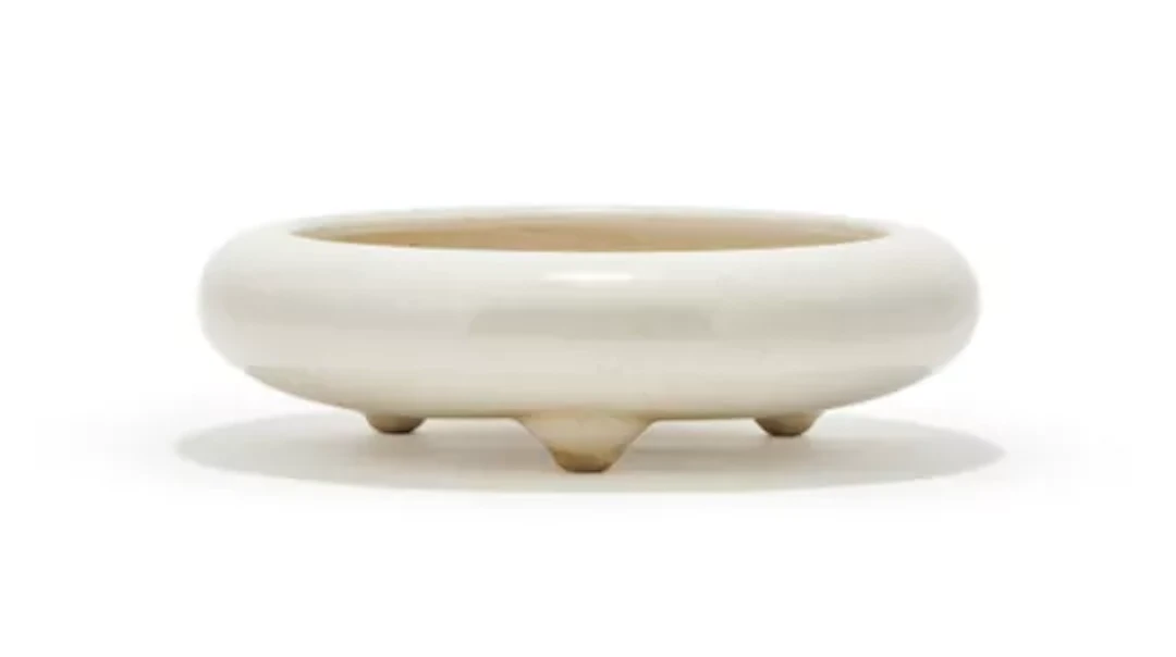 A Dehua type white glazed brush washer, Late Qing dynasty