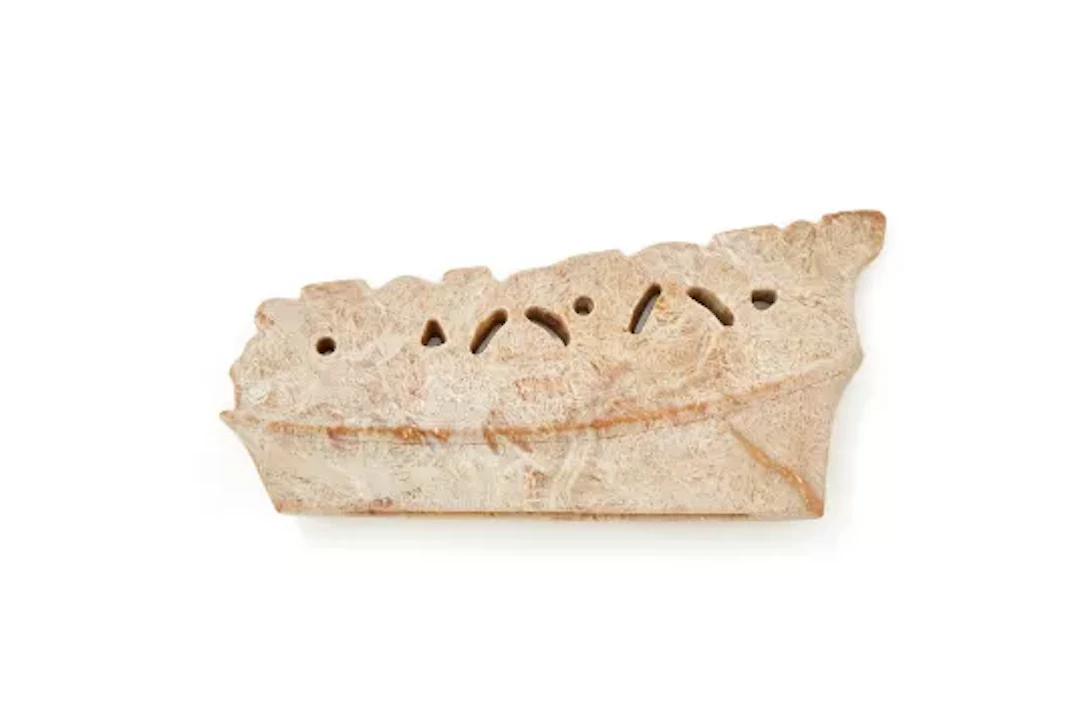 A Chinese calcified jade comb, Liangzhu style