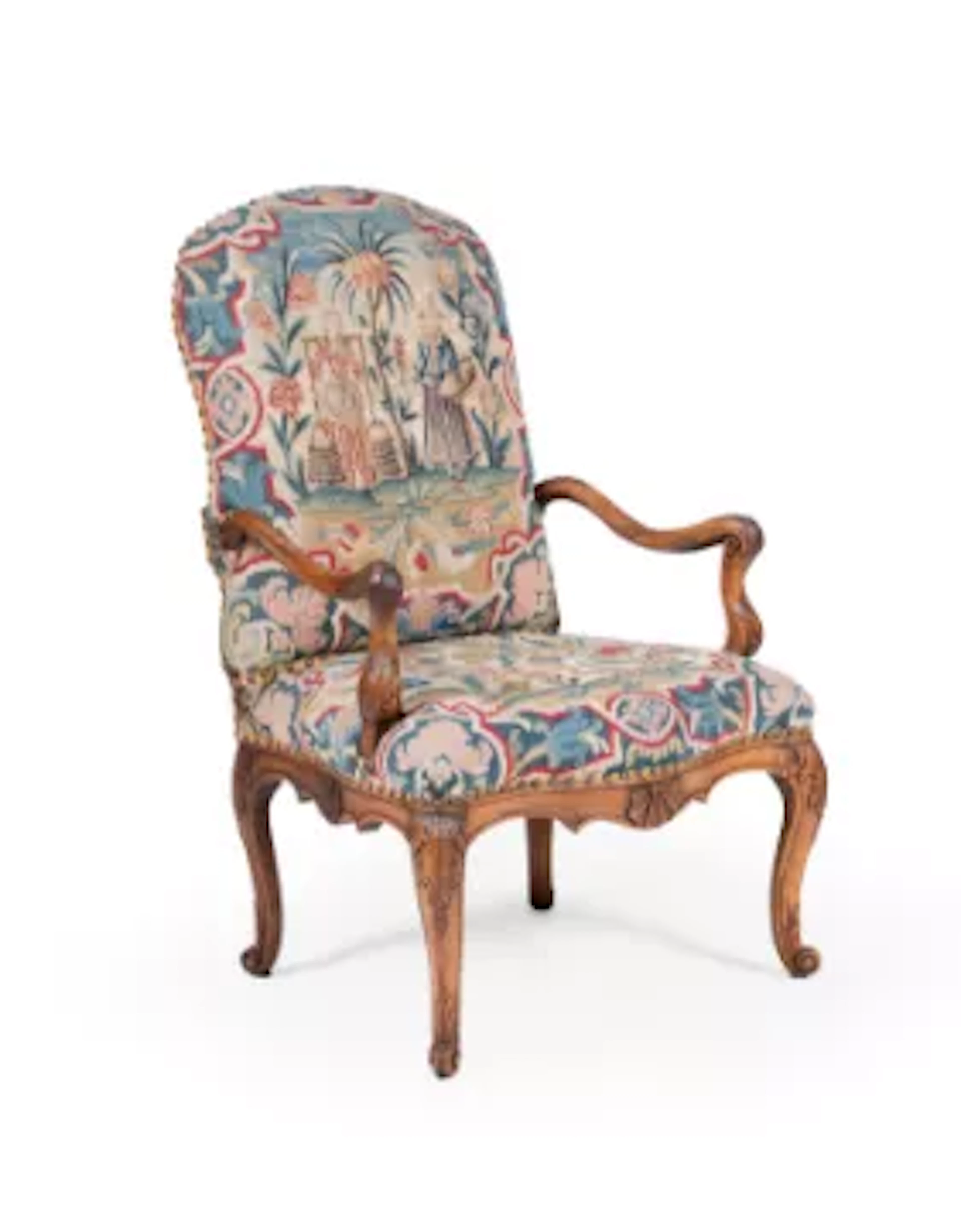 A RÉGENCE WALNUT AND NEEDLEWORK UPHOLSTERED FAUTEUIL, CIRCA 1720
