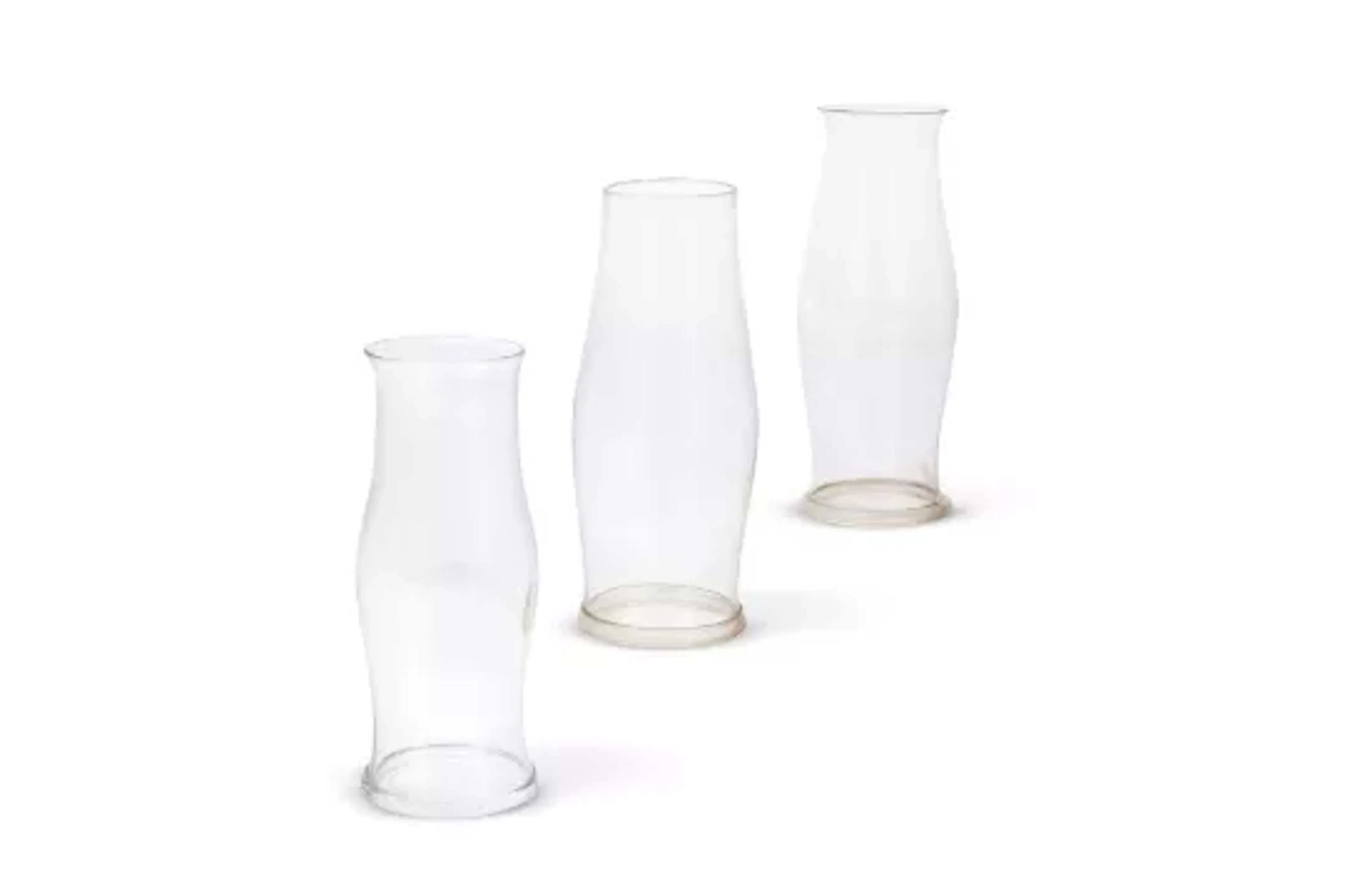 A GRADUATED GROUP OF THREE CLEAR GLASS STORM SHADES, LATE 19TH CENTURY