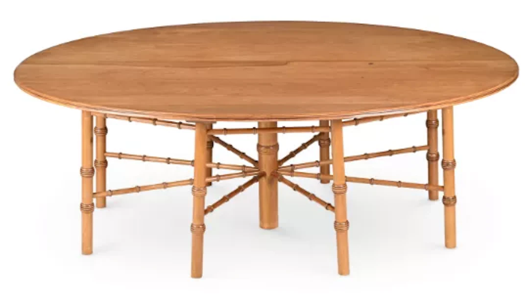 A WALNUT OVAL DINING TABLE, IN THE MANNER OF PHILIP WEBB, SUPPLIED