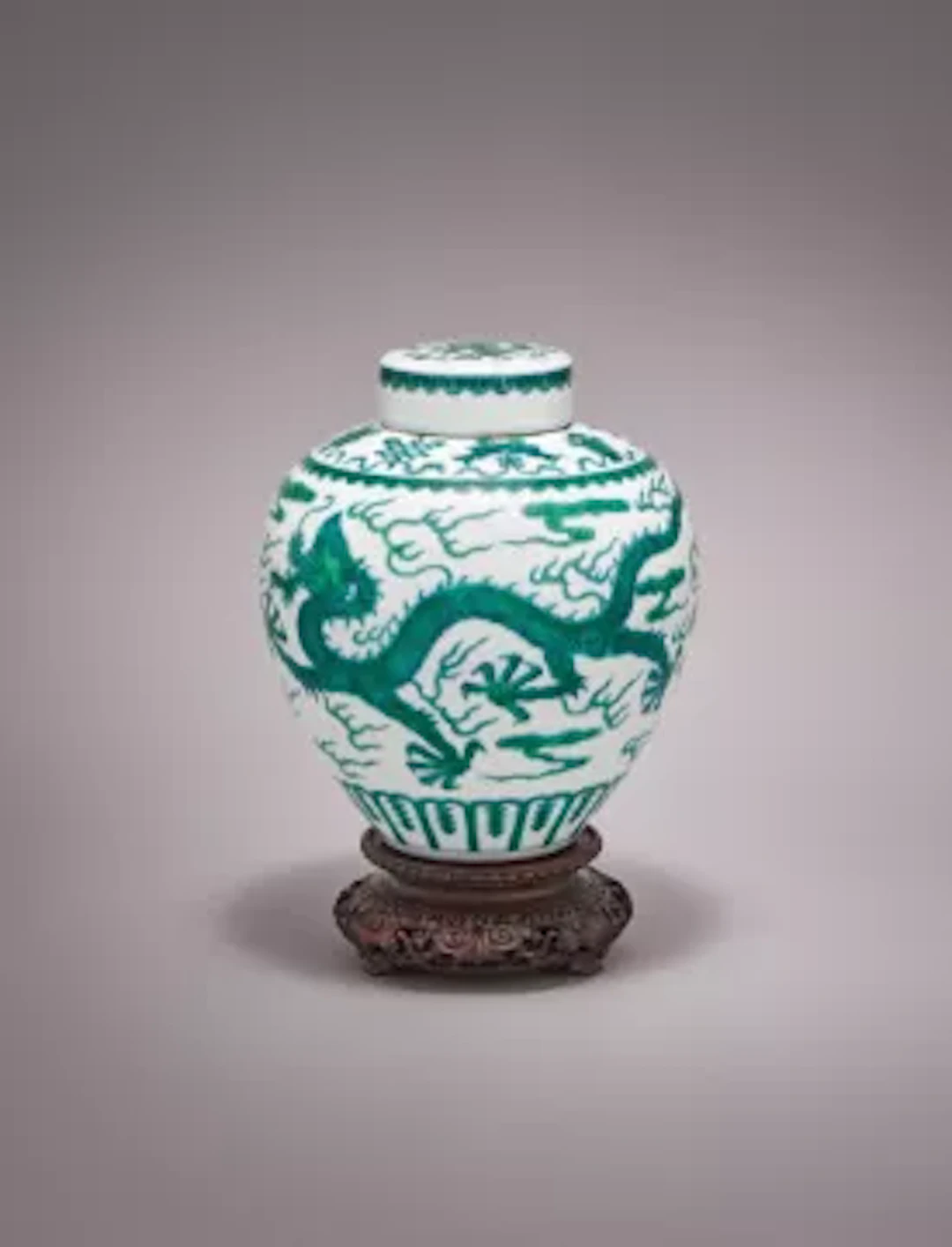 A Chinese green enamelled 'Dragon' jar and cover, Qianlong mark and