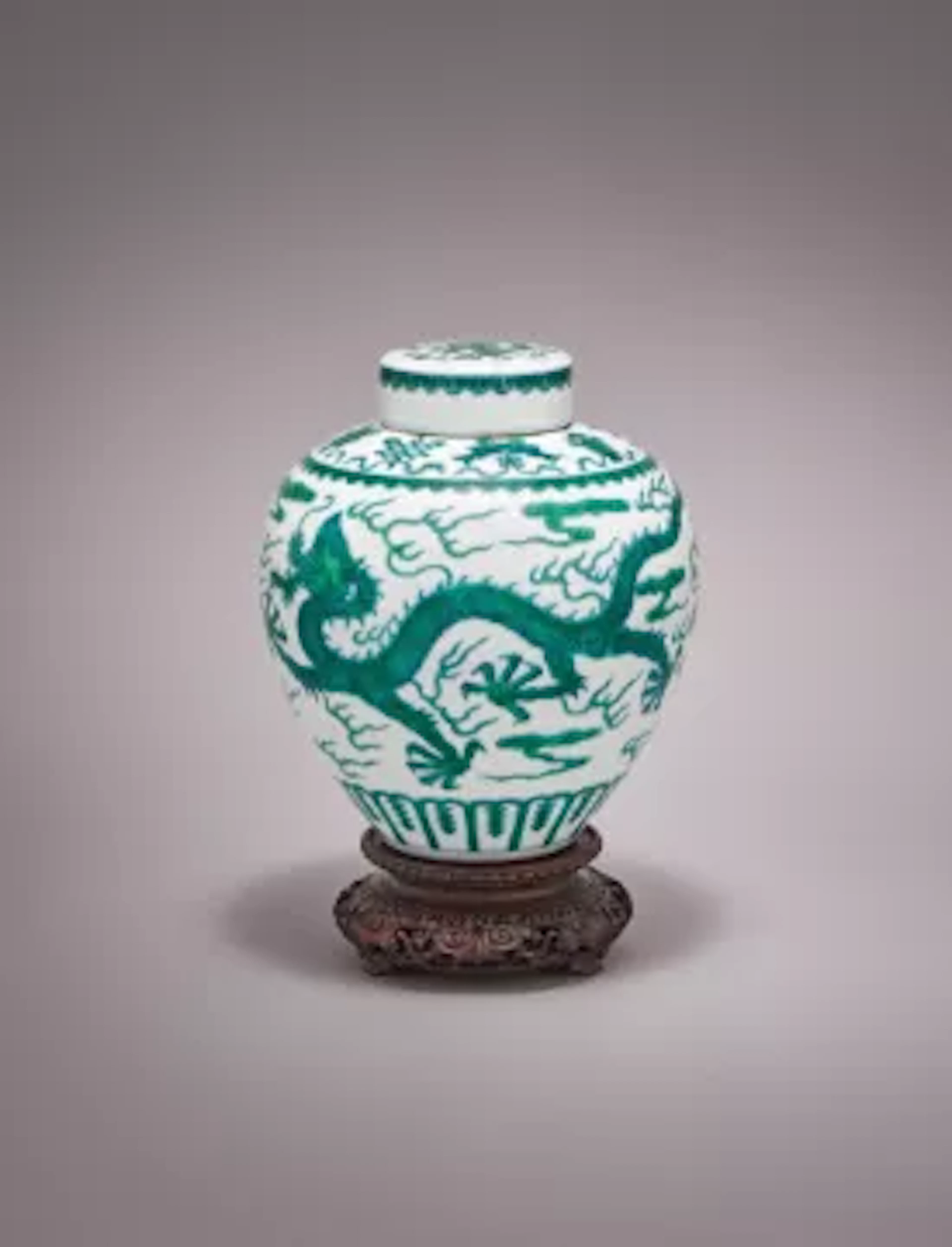 A Chinese green enamelled 'Dragon' jar and cover, Qianlong mark and