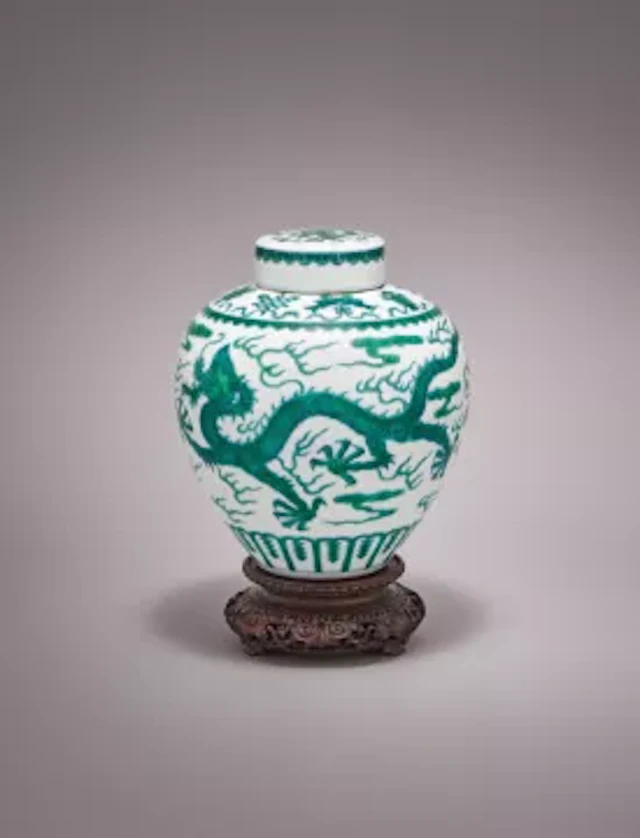 A Chinese green enamelled 'Dragon' jar and cover, Qianlong mark and