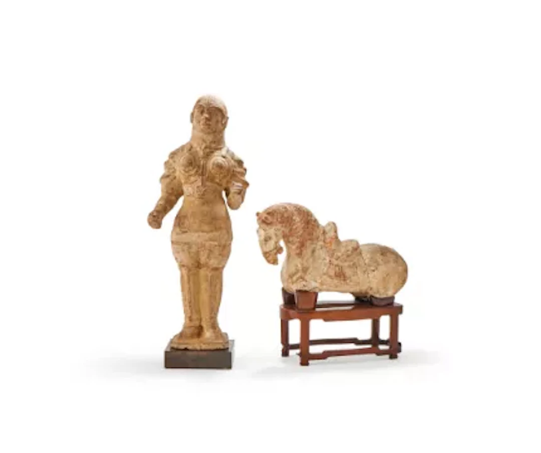 A Chinese terracotta figure of a guardian, Tang Dynasty (618-907)