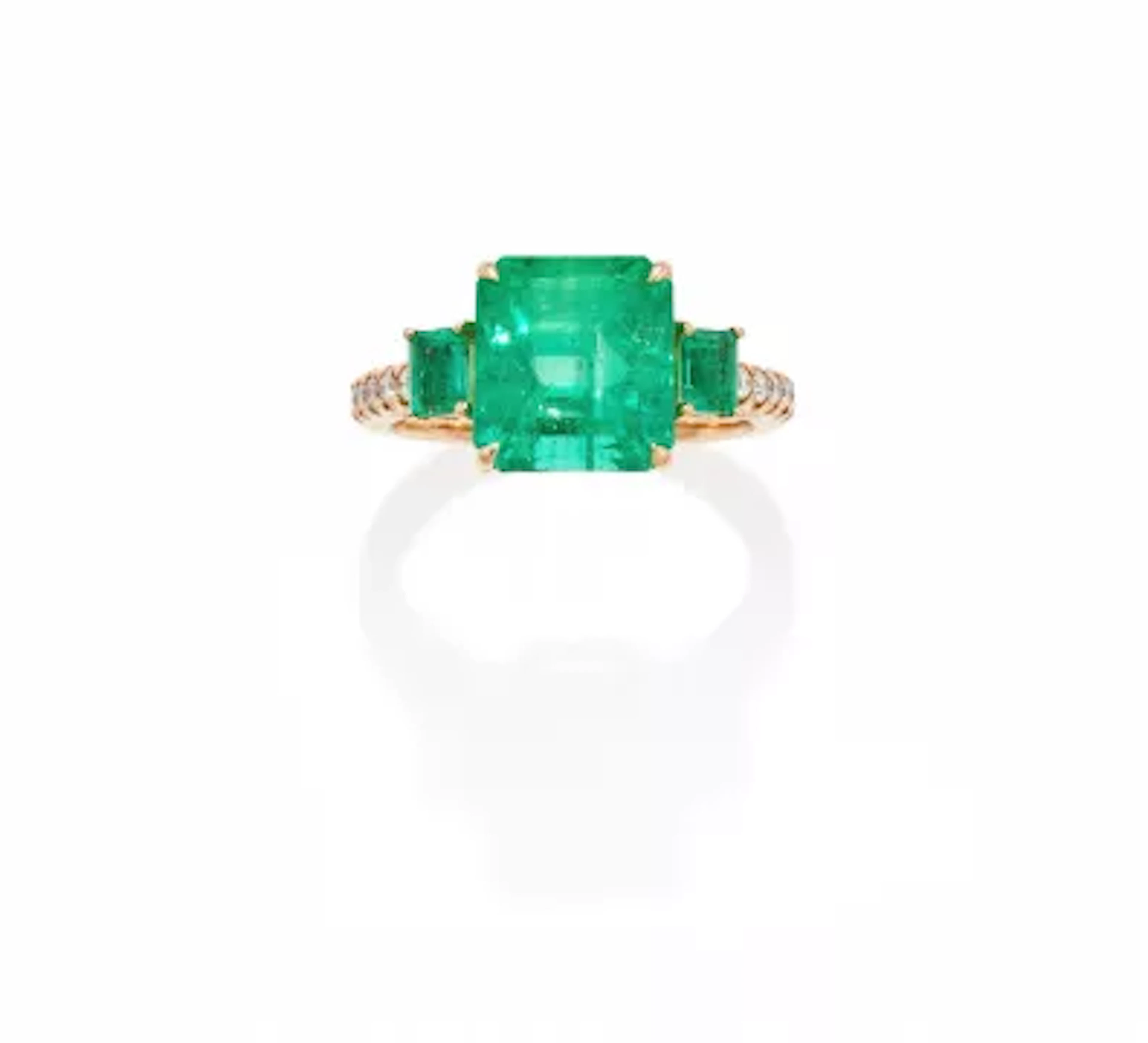 AN EMERALD AND DIAMOND RING