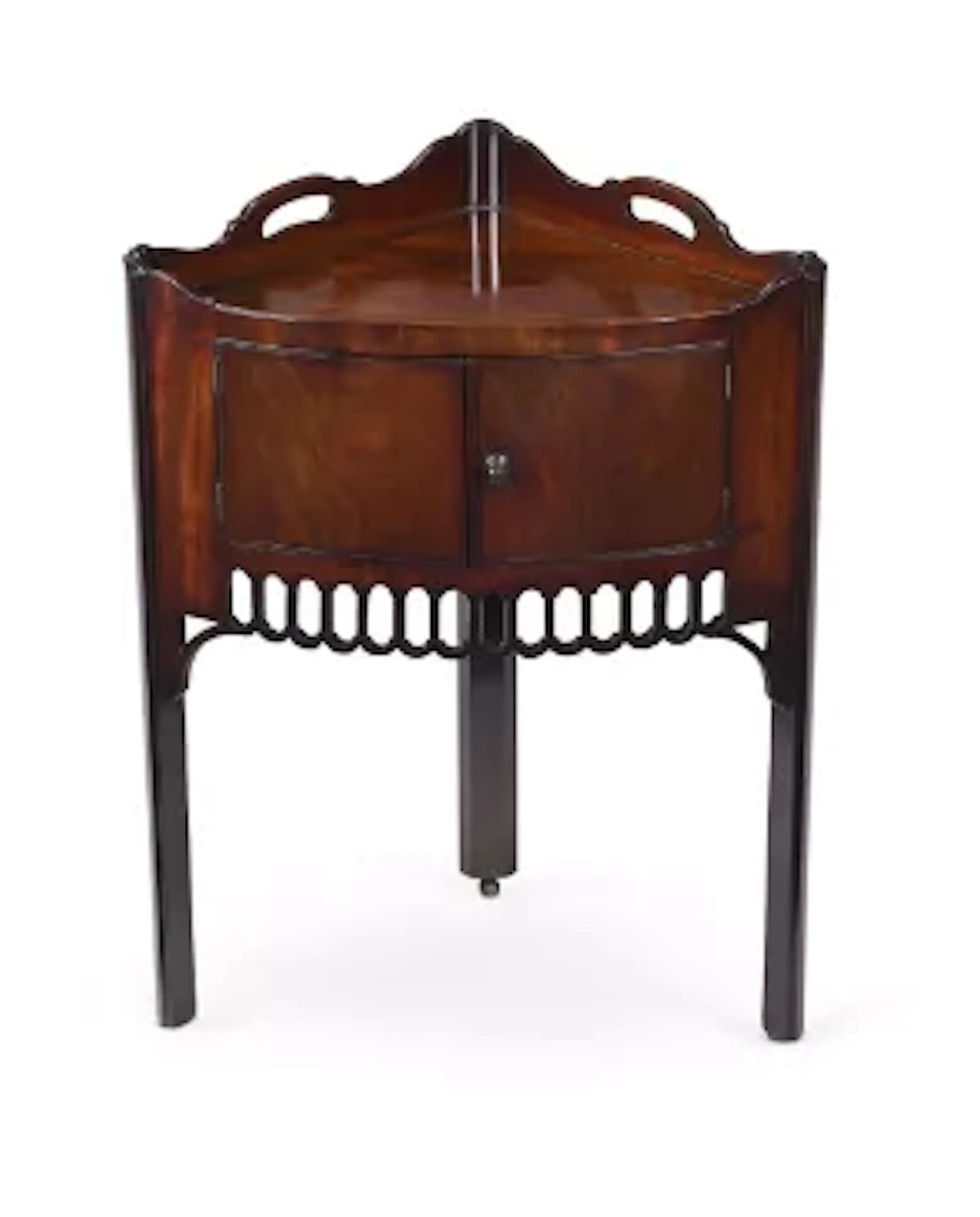 AN UNUSUAL GEORGE III MAHOGANY CORNER TABLE, IN THE MANNER OF THOMAS