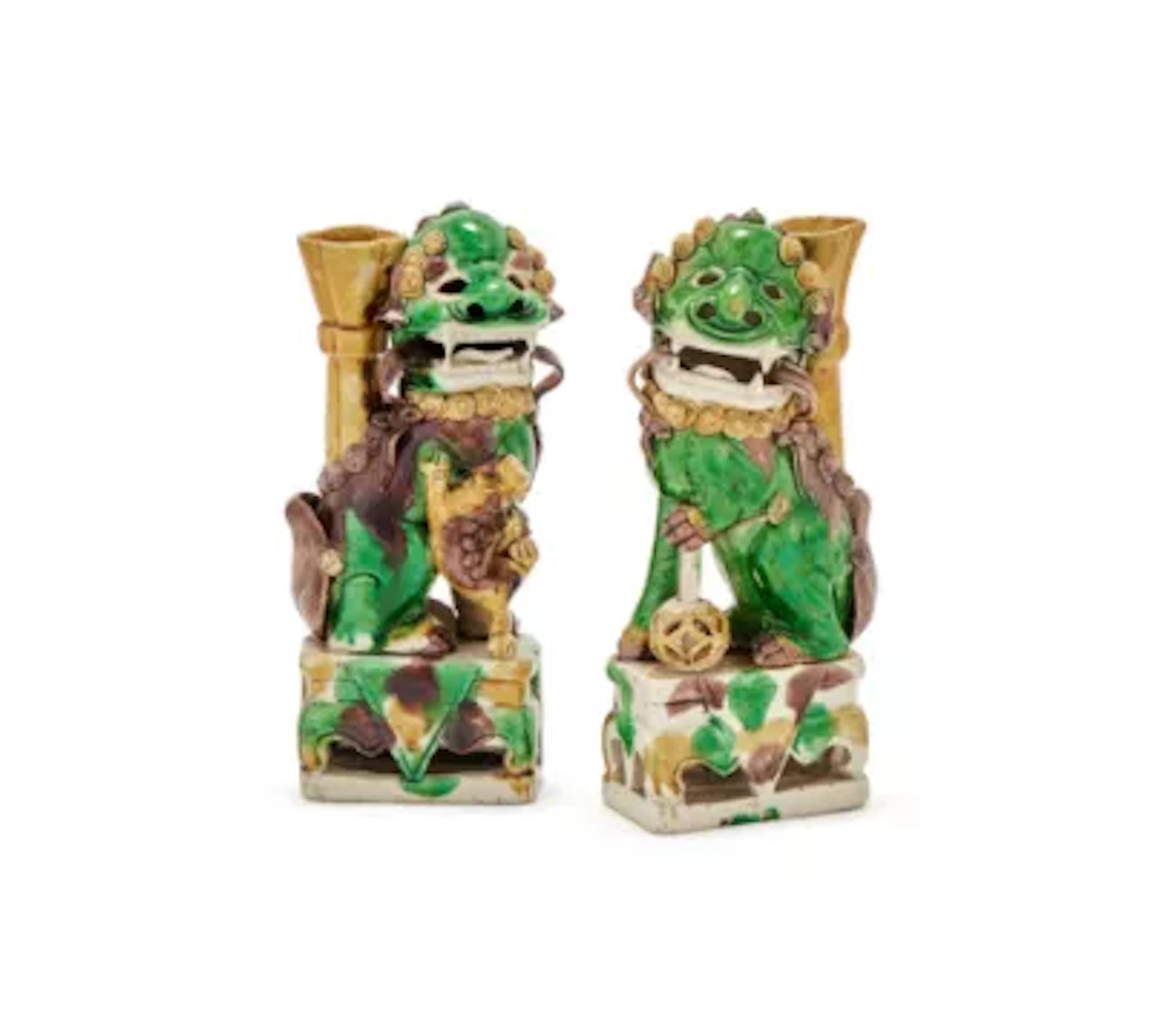 A pair of Chinese Famille Verte 'Buddhistic lion' joss-stick holders