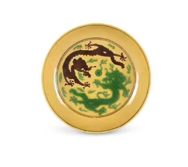 A Chinese Imperial porcelain yellow and green and aubergine-glazed