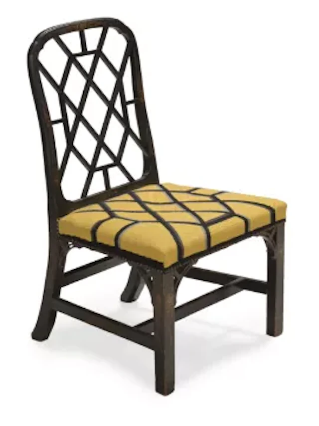A BLACK LACQUER AND GILT CHINOISERIE DECORATED 'COCKPEN' CHAIR, IN