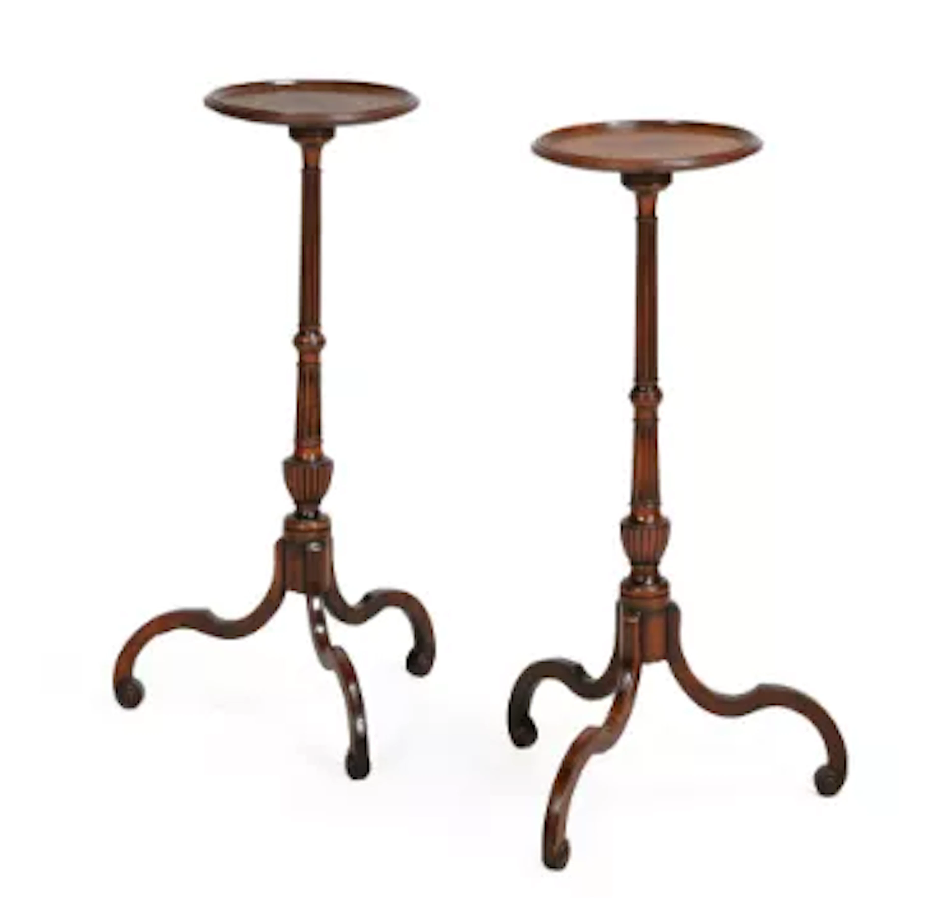 A PAIR OF GEORGE III MAHOGANY CANDLE STANDS, IN THE MANNER OF INCE