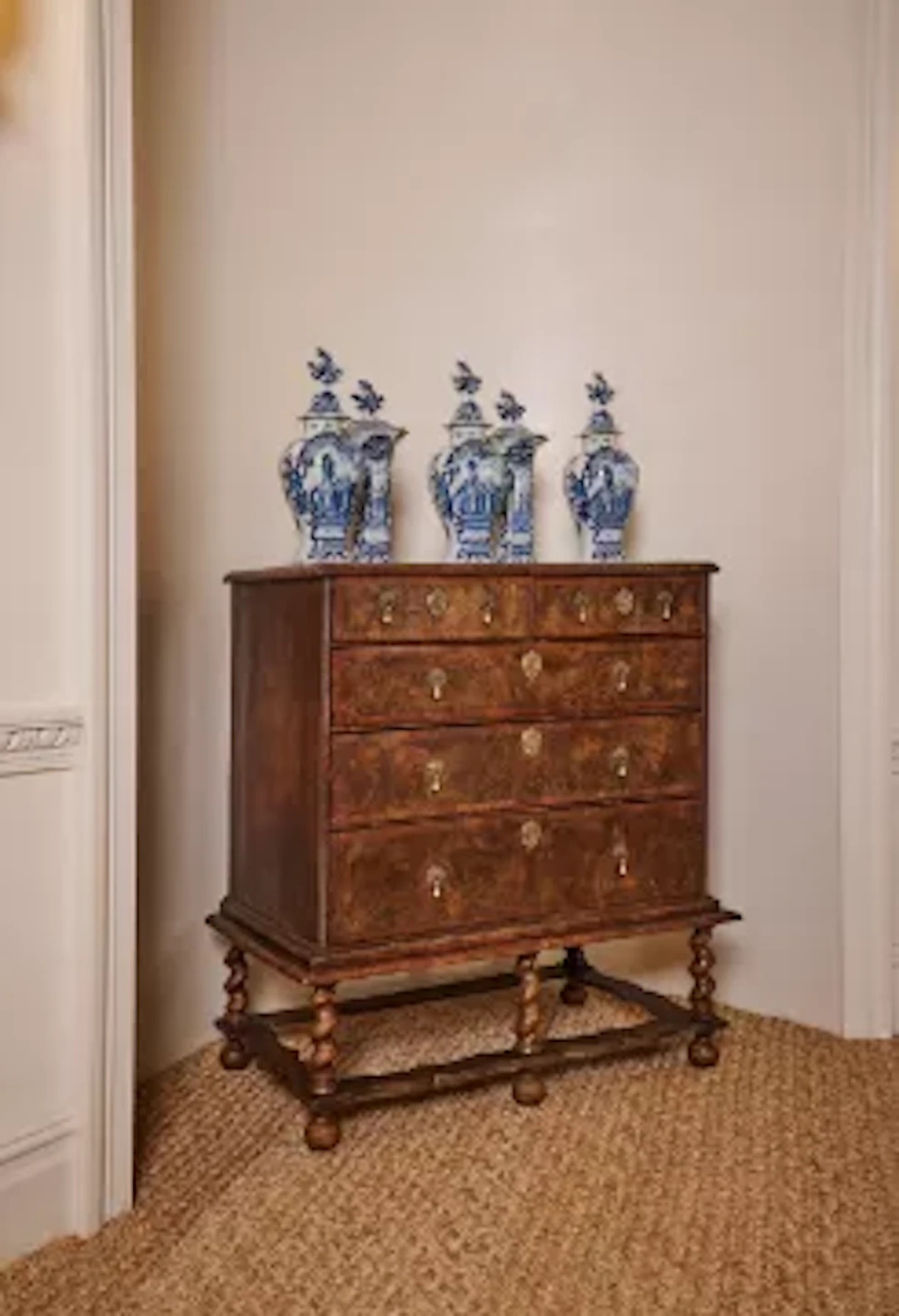 A QUEEN ANNE OLIVEWOOD OYSTER, WALNUT AND HOLLY CHEST ON STAND, CIRCA 1710