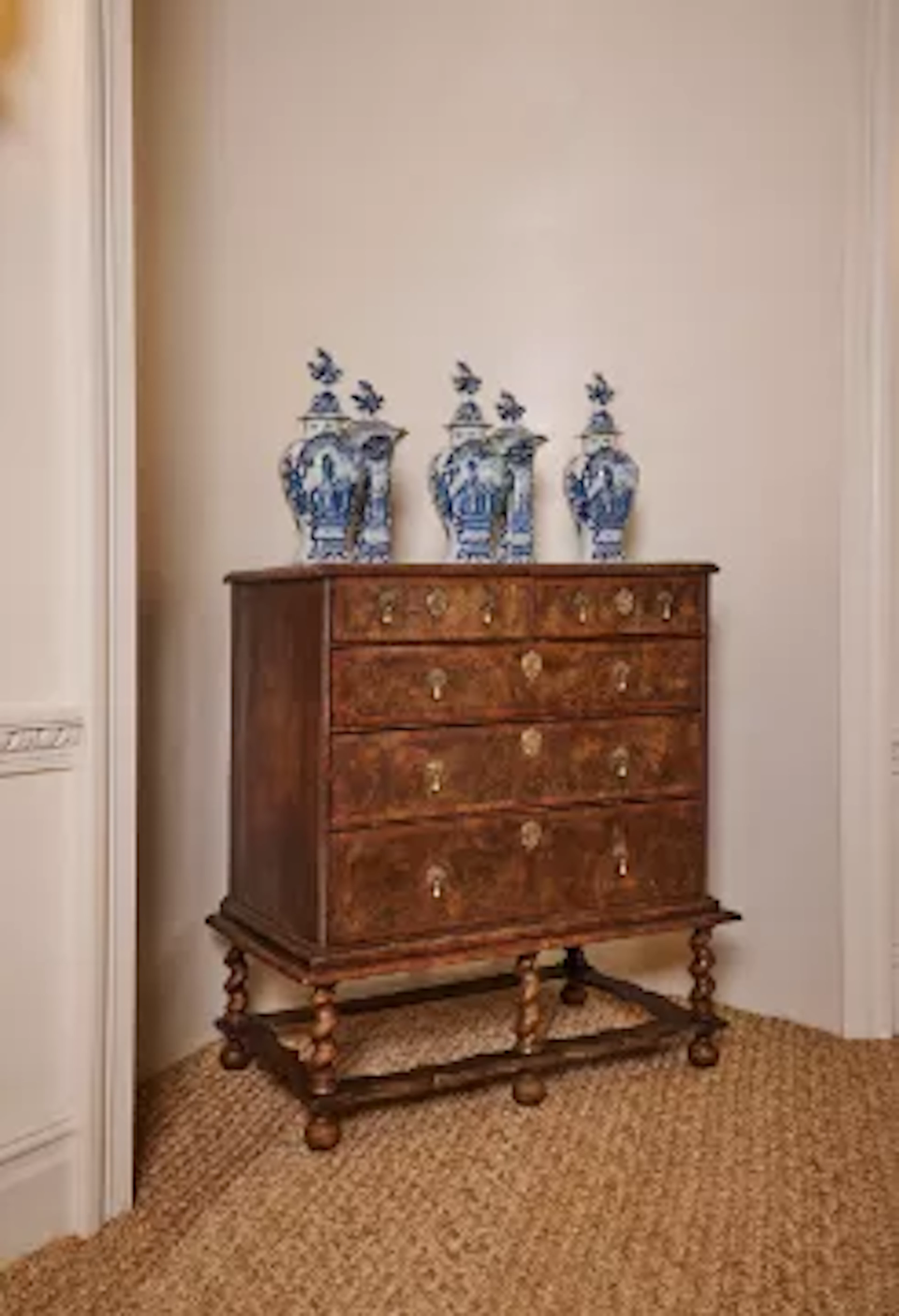 A QUEEN ANNE OLIVEWOOD OYSTER, WALNUT AND HOLLY CHEST ON STAND, CIRCA 1710