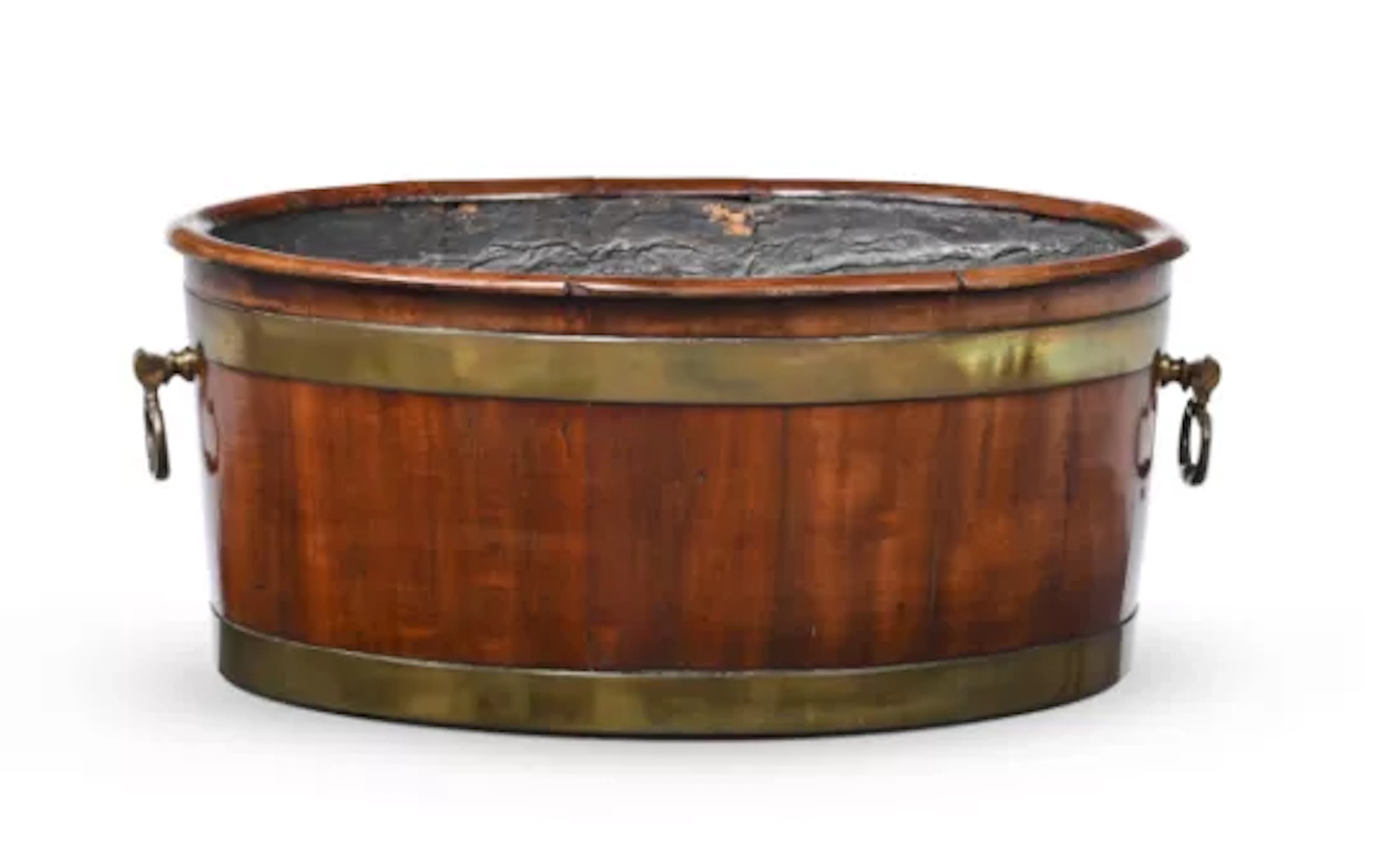 A GEORGE III MAHOGANY AND BRASS BOUND OVAL WINE COOLER, CIRCA 1780
