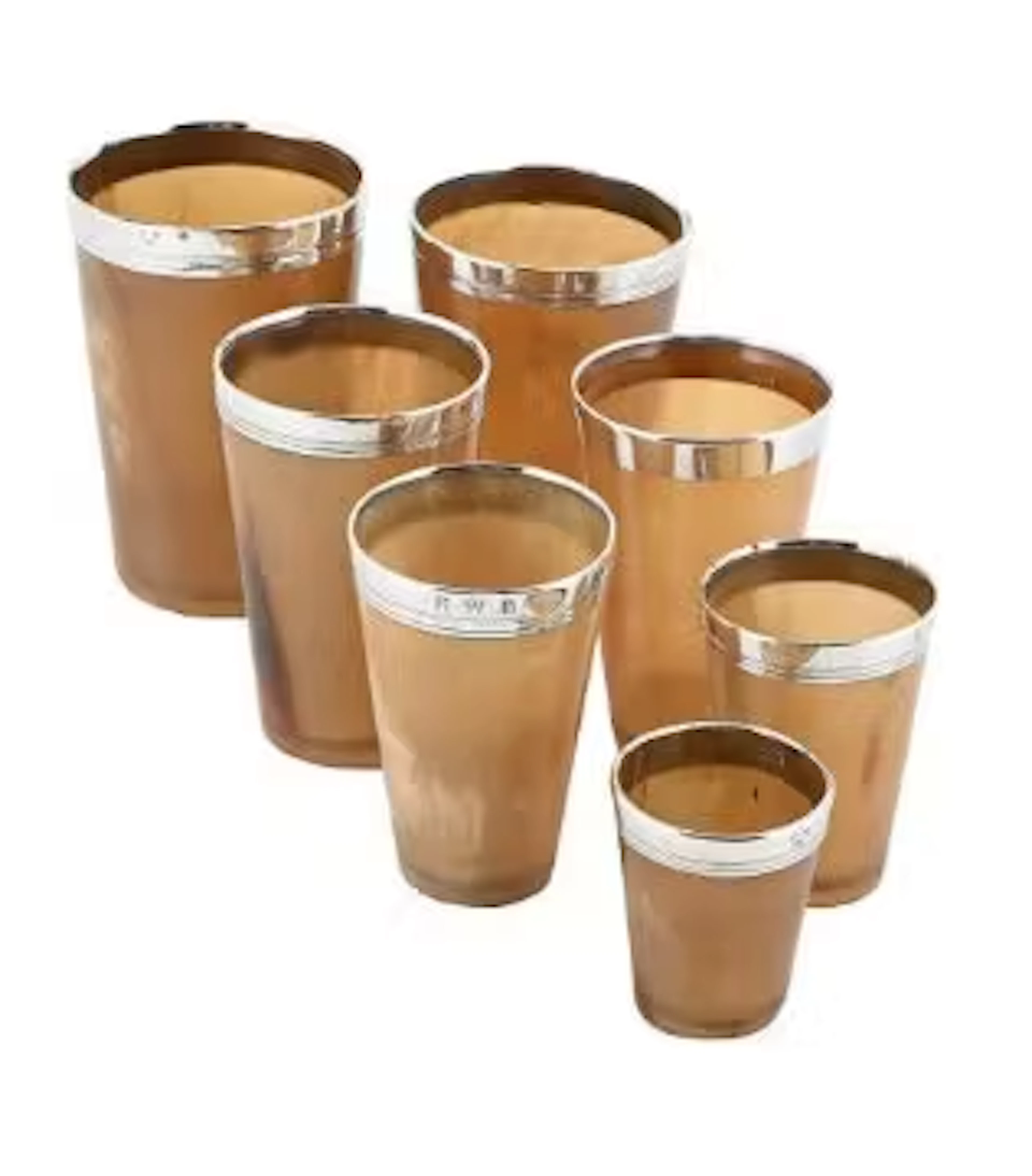 A SET OF SIX VICTORIAN SILVER MOUNTED GRADUATED HORN BEAKERS