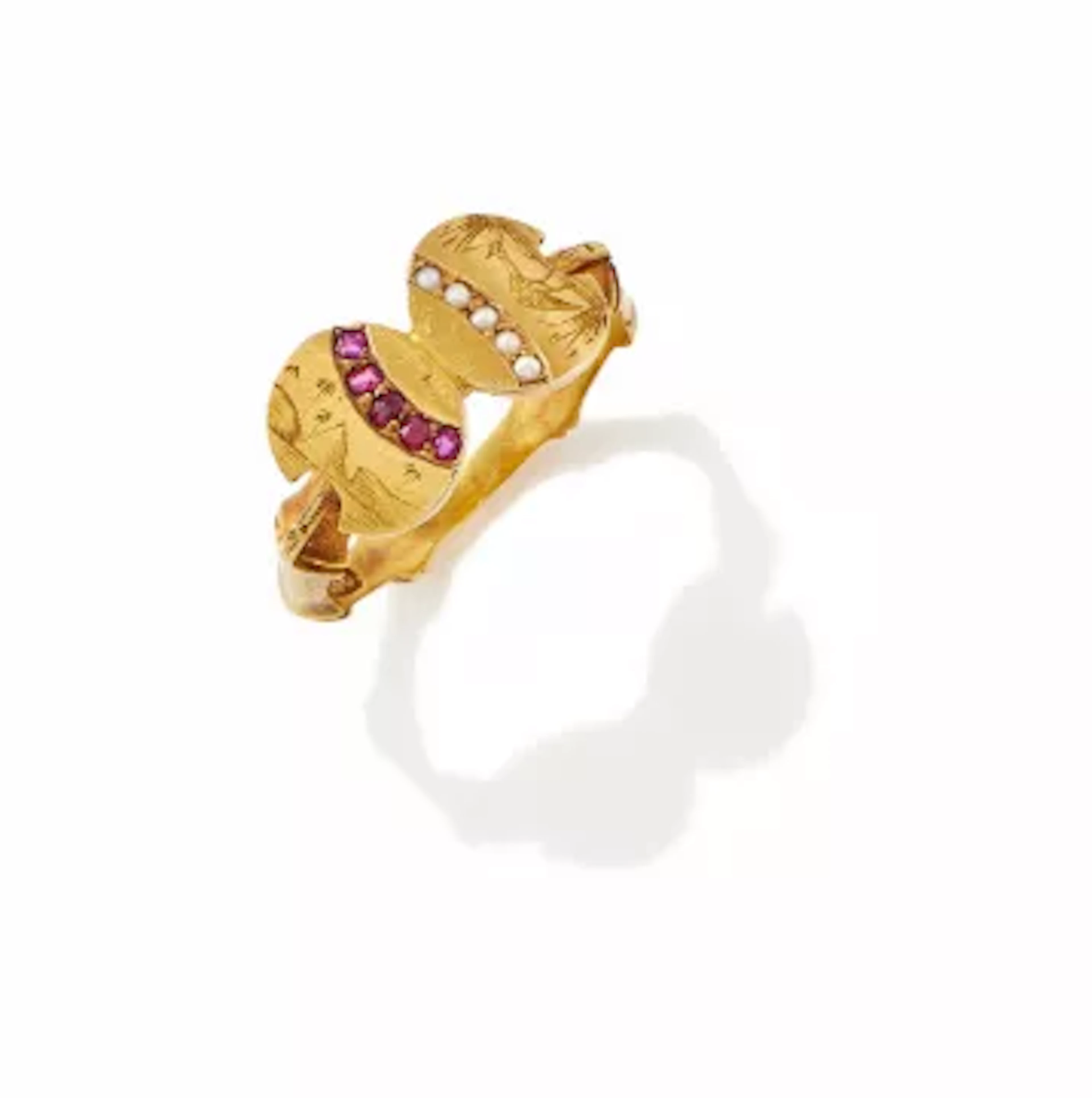 AN AESTHETIC PERIOD RUBY AND SEED PEARL RING, CIRCA 1880