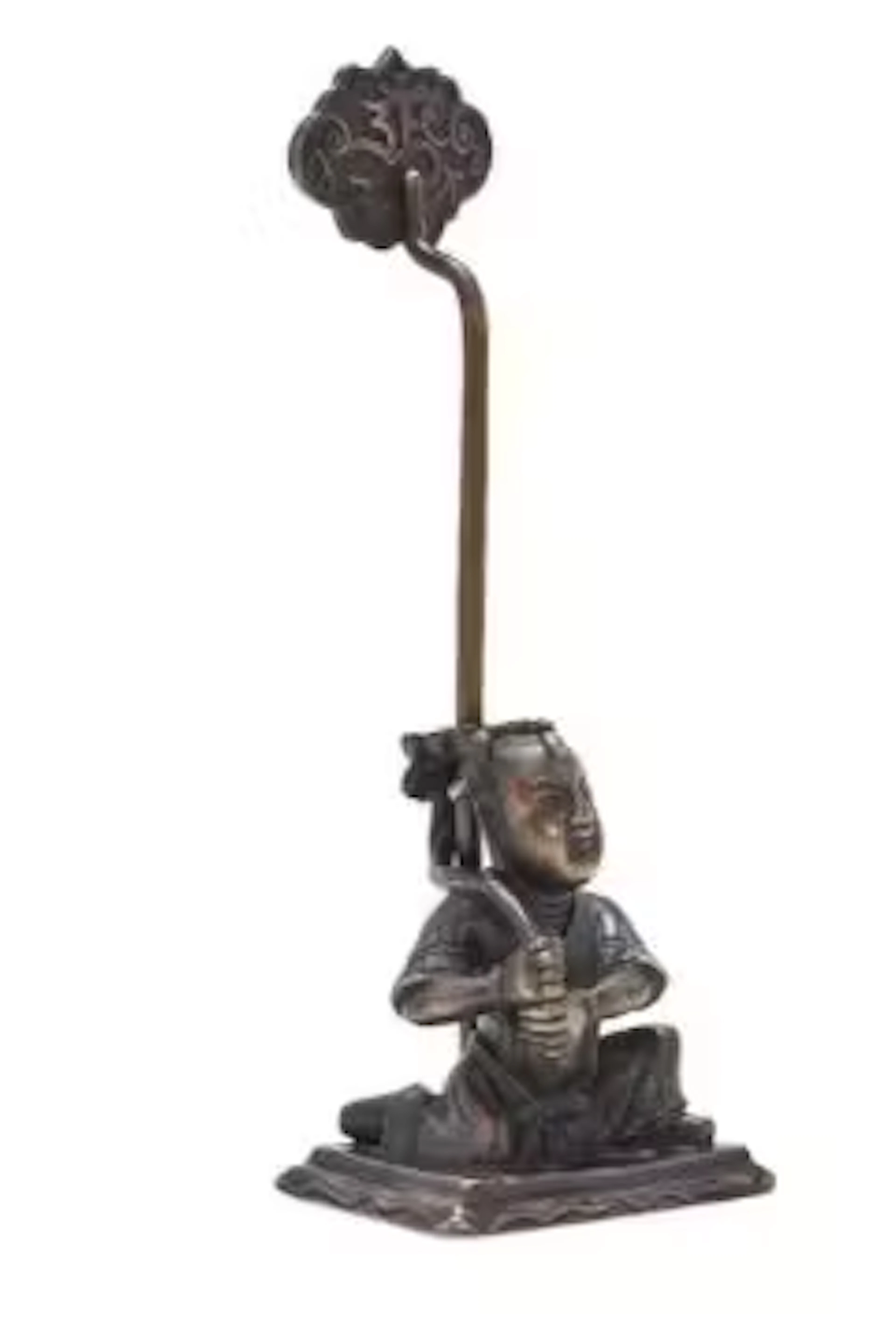 A Chinese bronze 'Boy' candle holder
