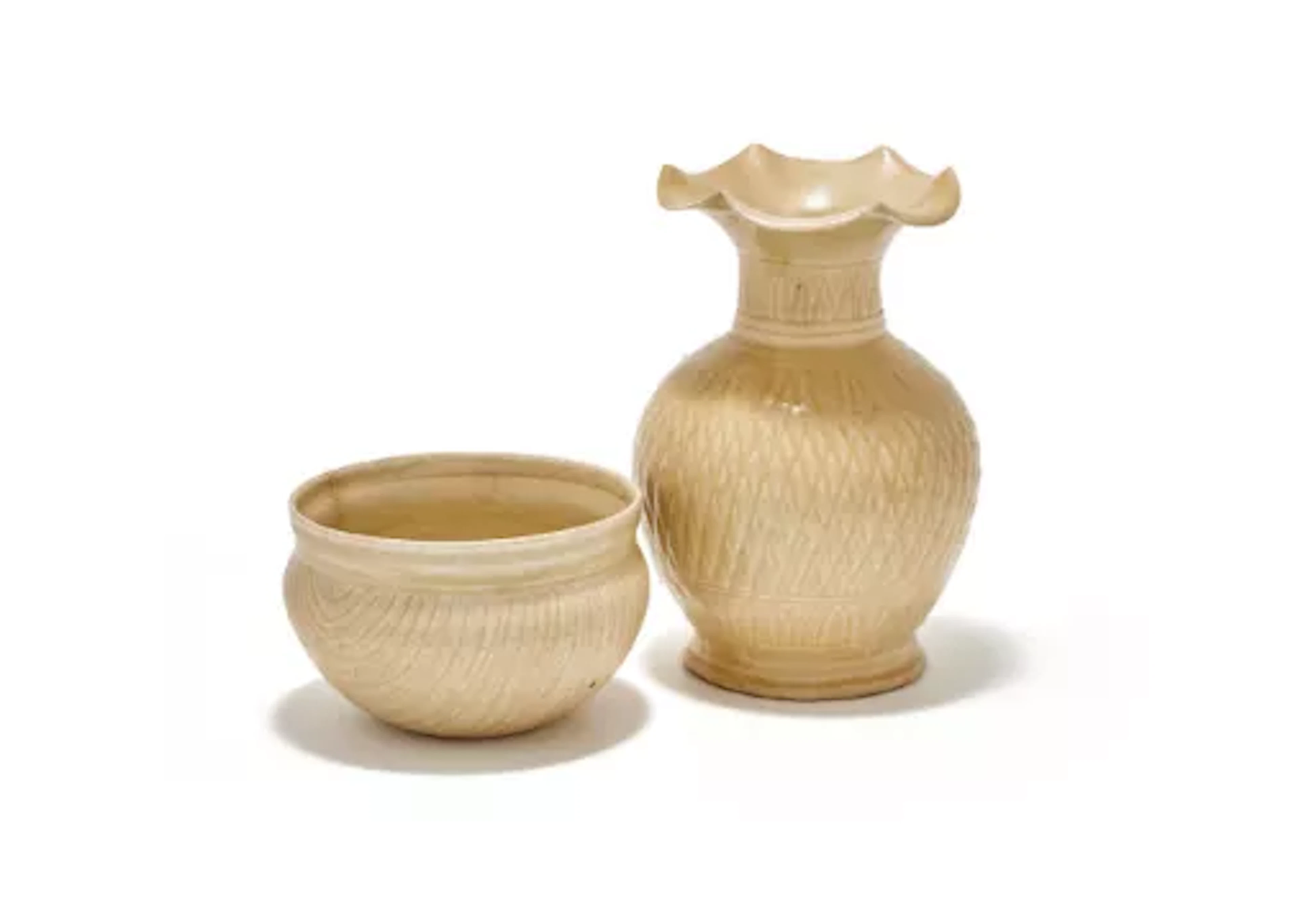 A Chinese Qingbai glazed grain measure, Southern Song Dynasty (1127-1279)