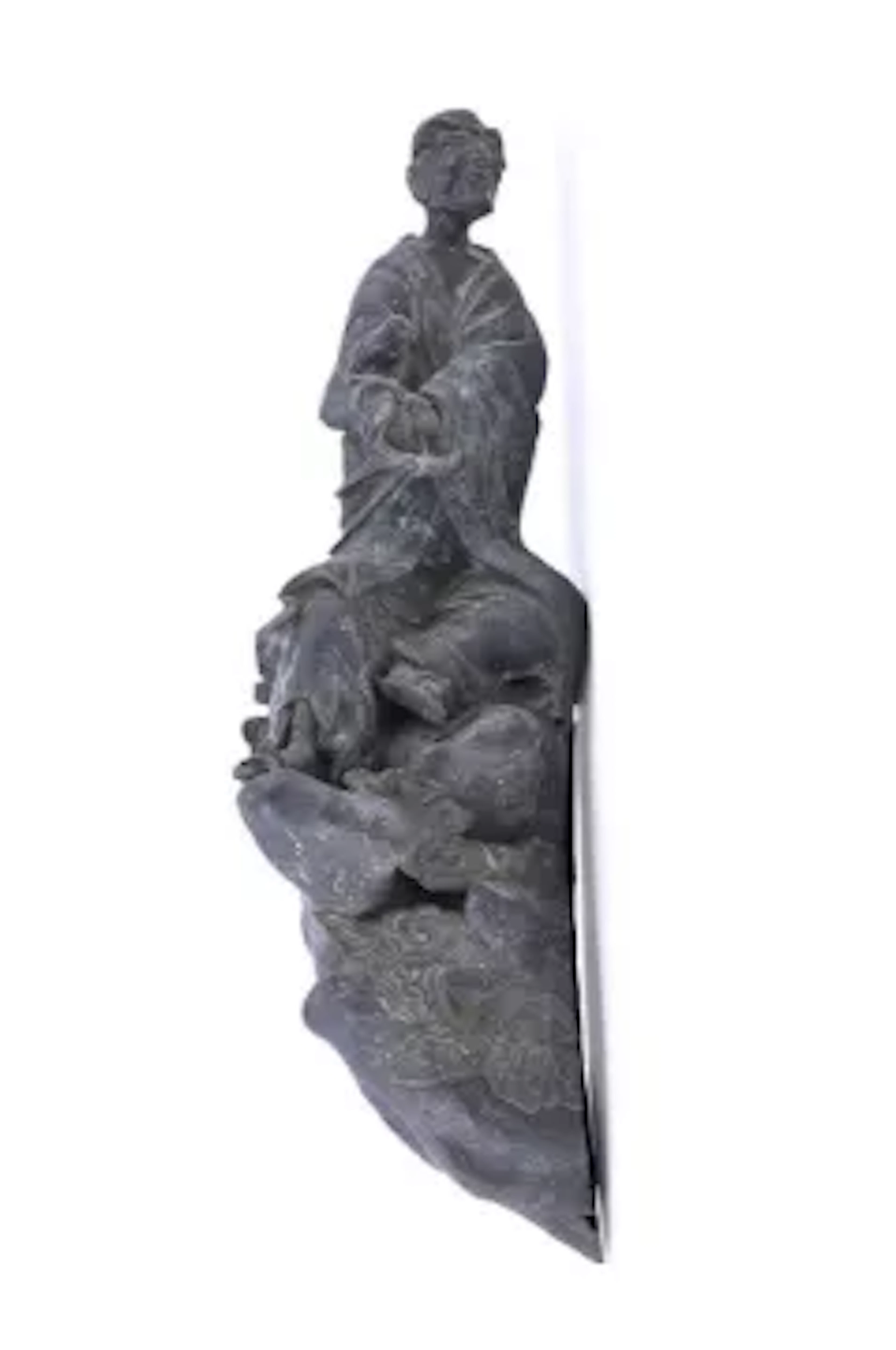 A fragmentary bronze figure of a sage