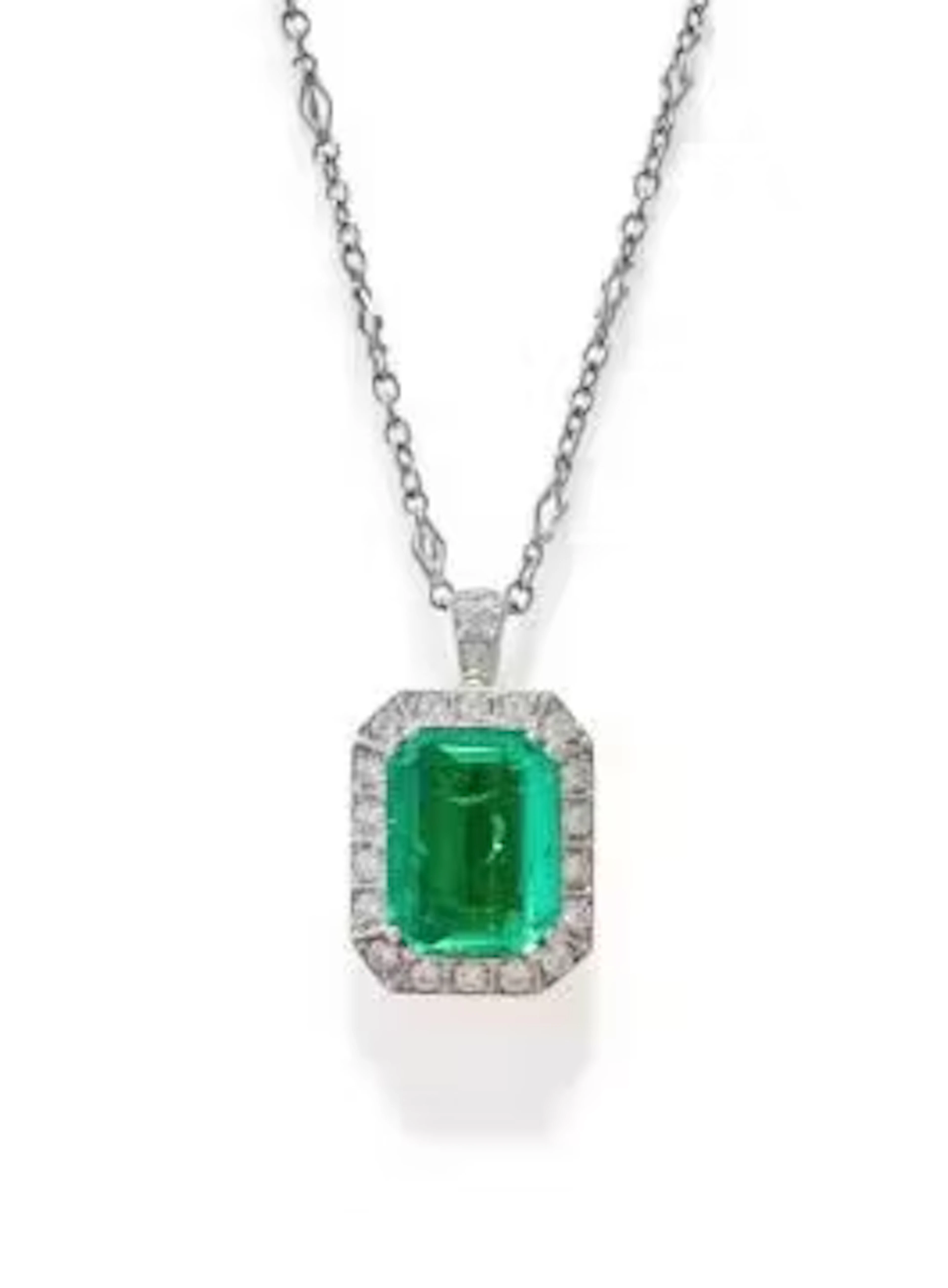 AN EMERALD AND DIAMOND PENDANT