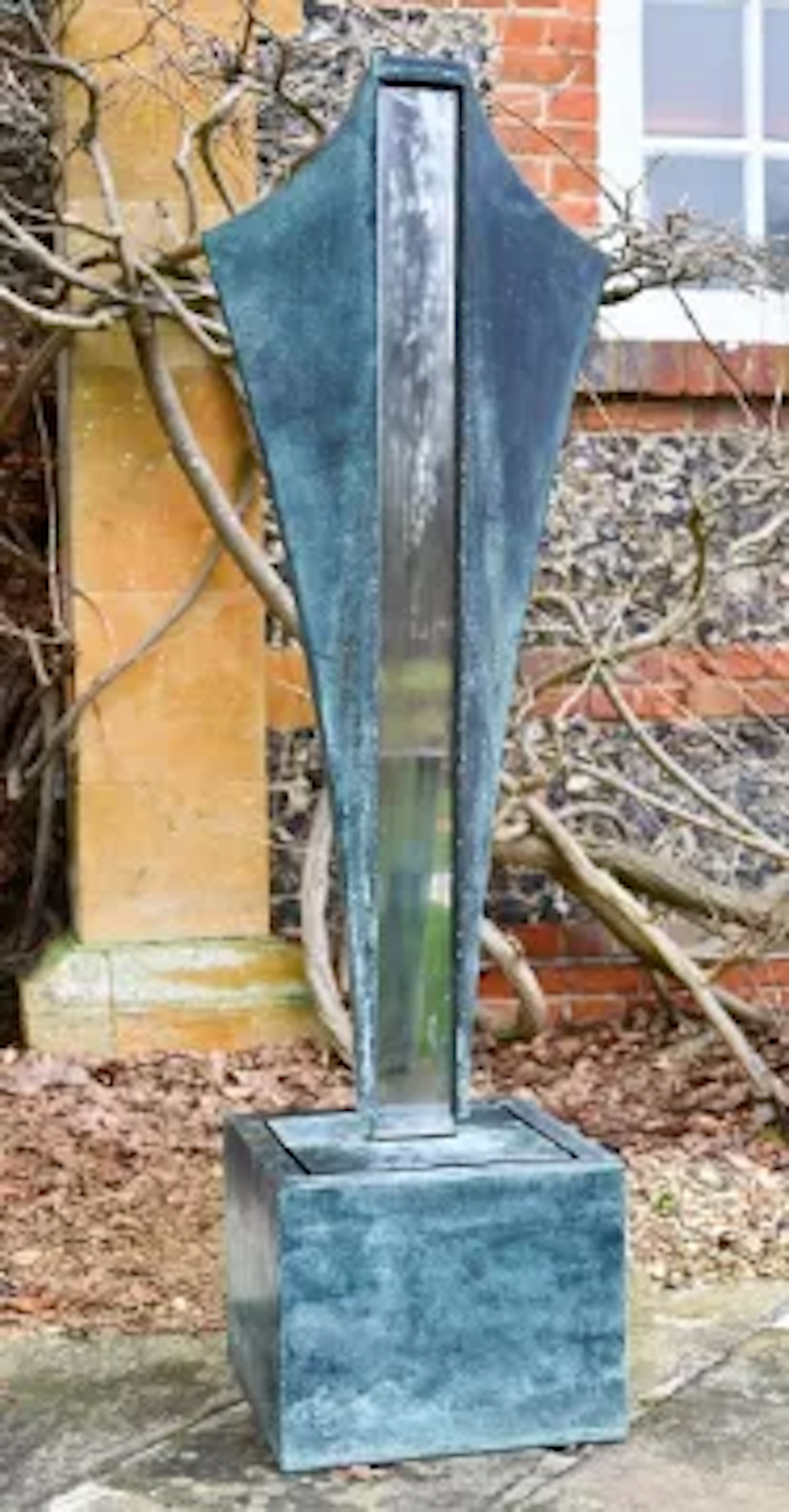 λ A BRONZE, PATINATED METAL AND MIRRORED ‘VOLANTE’ WATER SCULPTURE