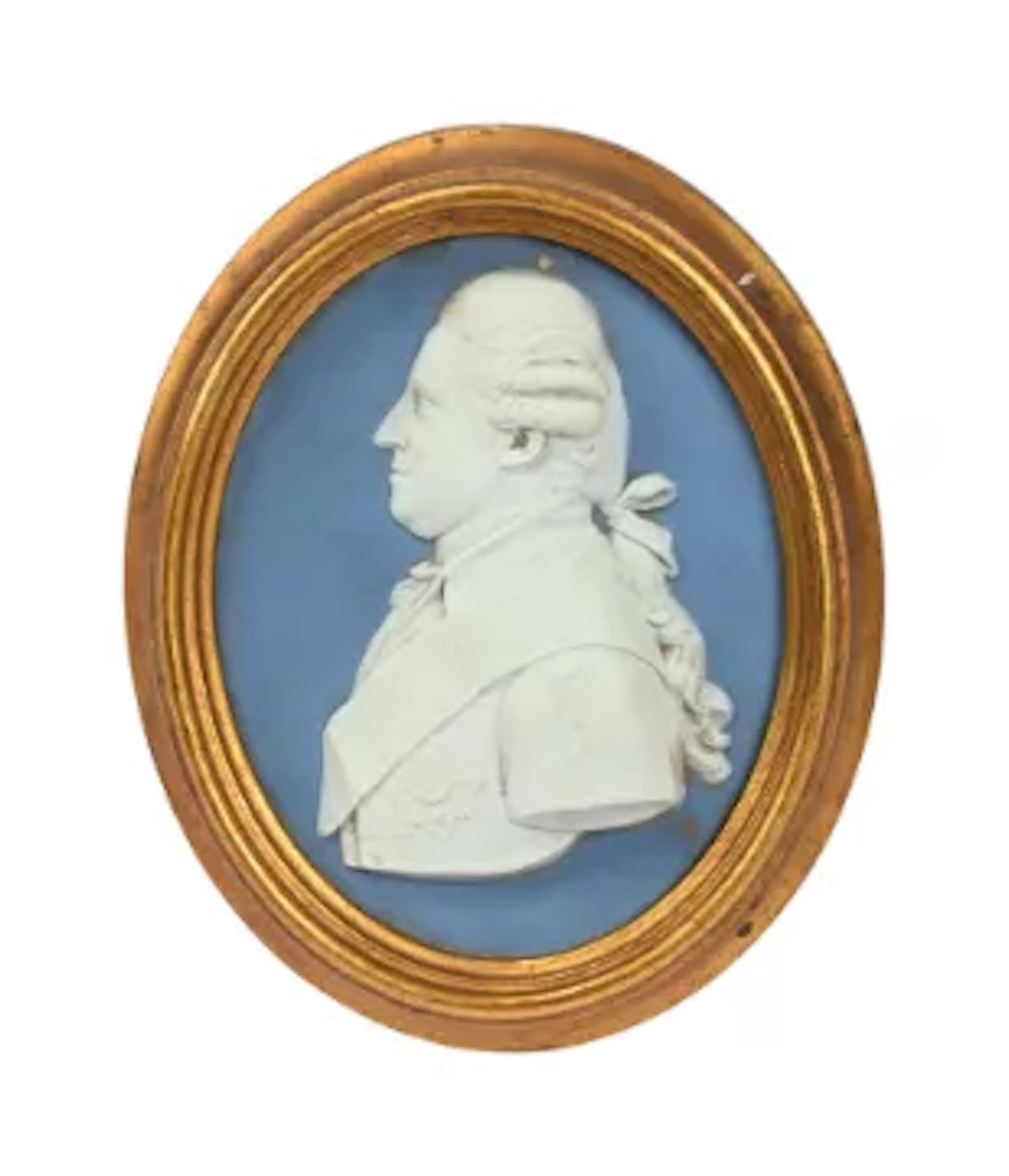 A WEDGWOOD PALE BLUE JASPER OVAL PORTRAIT RELIEF OF GEORGE III, FIRST