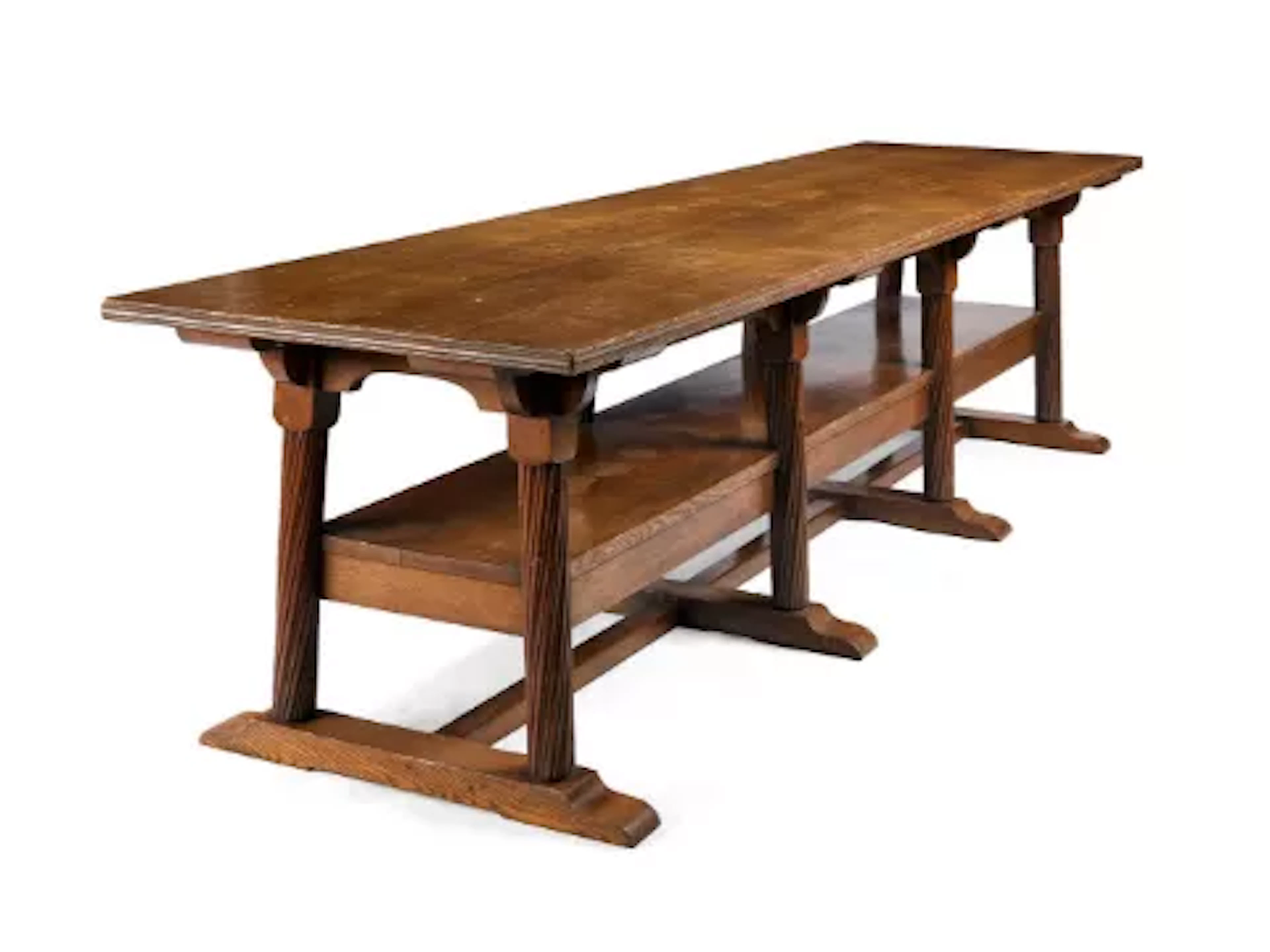 A LONG OAK REFECTORY TABLE BY PHILIP WEBB (BRITISH, 1839-1915), FOR