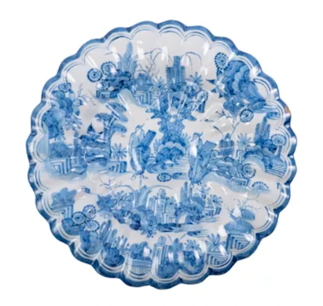 A DUTCH DELFT OR NORTH GERMAN FAIENCE TRANSITIONAL STYLE SCALLOPED