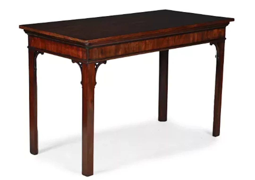 A GEORGE III MAHOGANY SERVING TABLE, IN THE MANNER OF THOMAS CHIPPENDALE