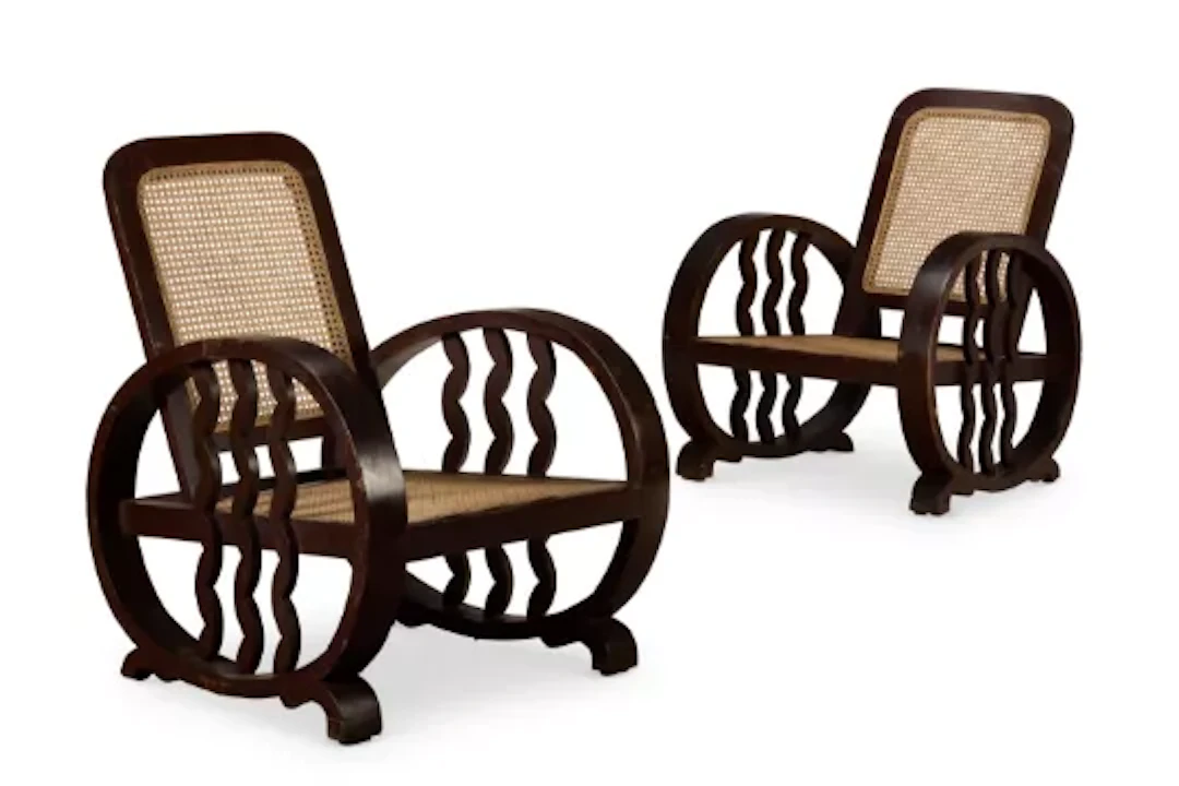 A PAIR OF BOMBAY ART DECO PAINTED TEAK AND CANED SEAT ARMCHAIRS, CIRCA 1930
