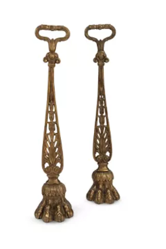 A PAIR OF BRONZE DOOR STOPS OR DOOR PORTERS, CIRCA 1830-1840