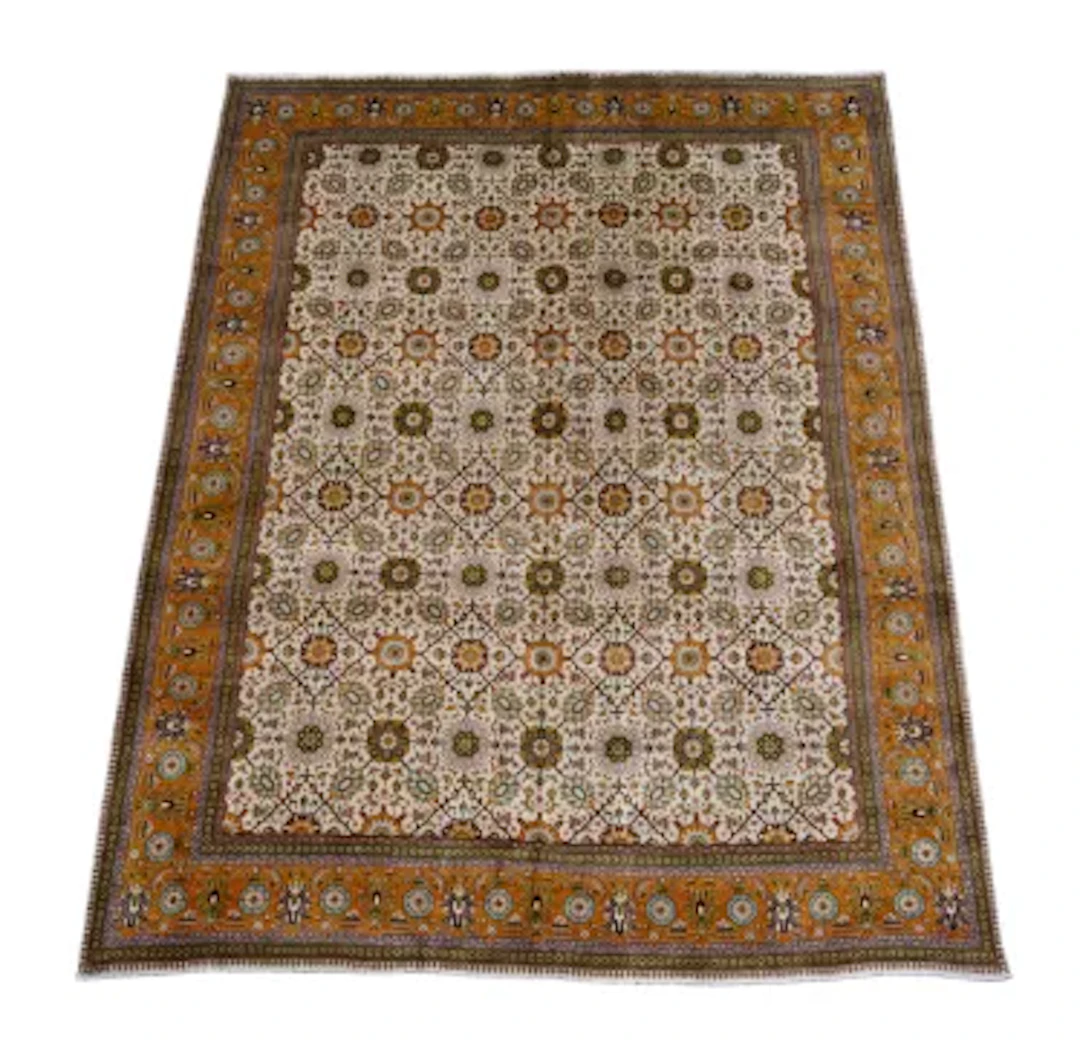A TABRIZ CARPET, OF SHAH-ABBAS DESIGN