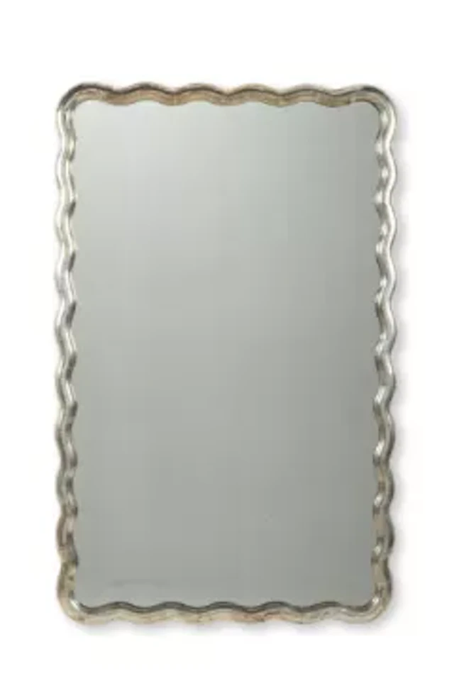 A SILVERED WOOD WAVE FRAMED MIRROR, FRENCH, LATE 19TH/ EARLY 20TH CENTURY