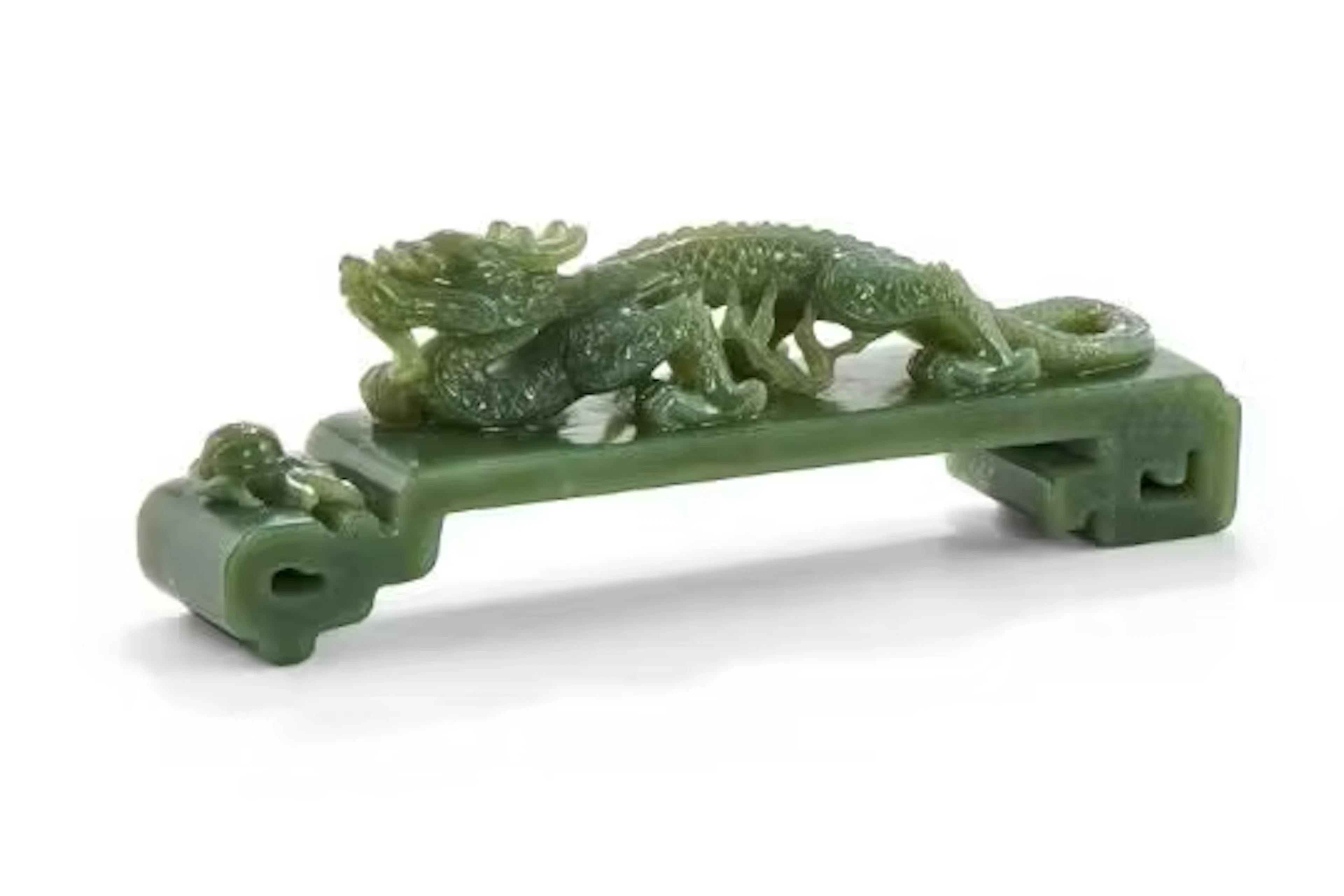 A Chinese spinach jade 'Dragon' paper weight