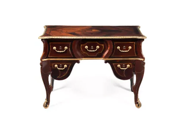 Y A NORTH EUROPEAN ROSEWOOD, BRASS INLAID AND ORMOLU MOUNTED DESK