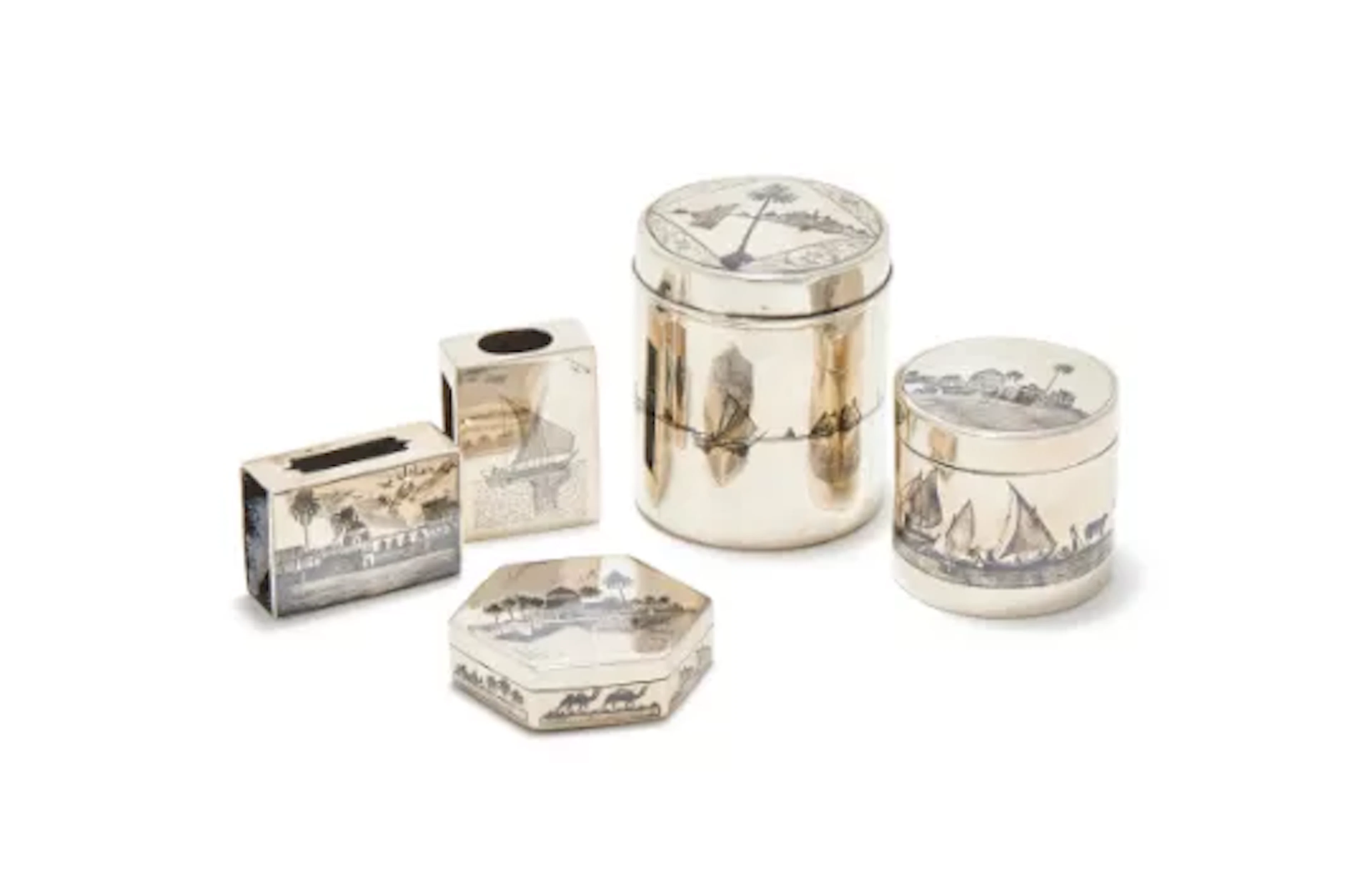 THREE EGYPTIAN SILVER AND NIELLO BOXES AND TWO MATCHBOX HOLDERS, UNMARKED